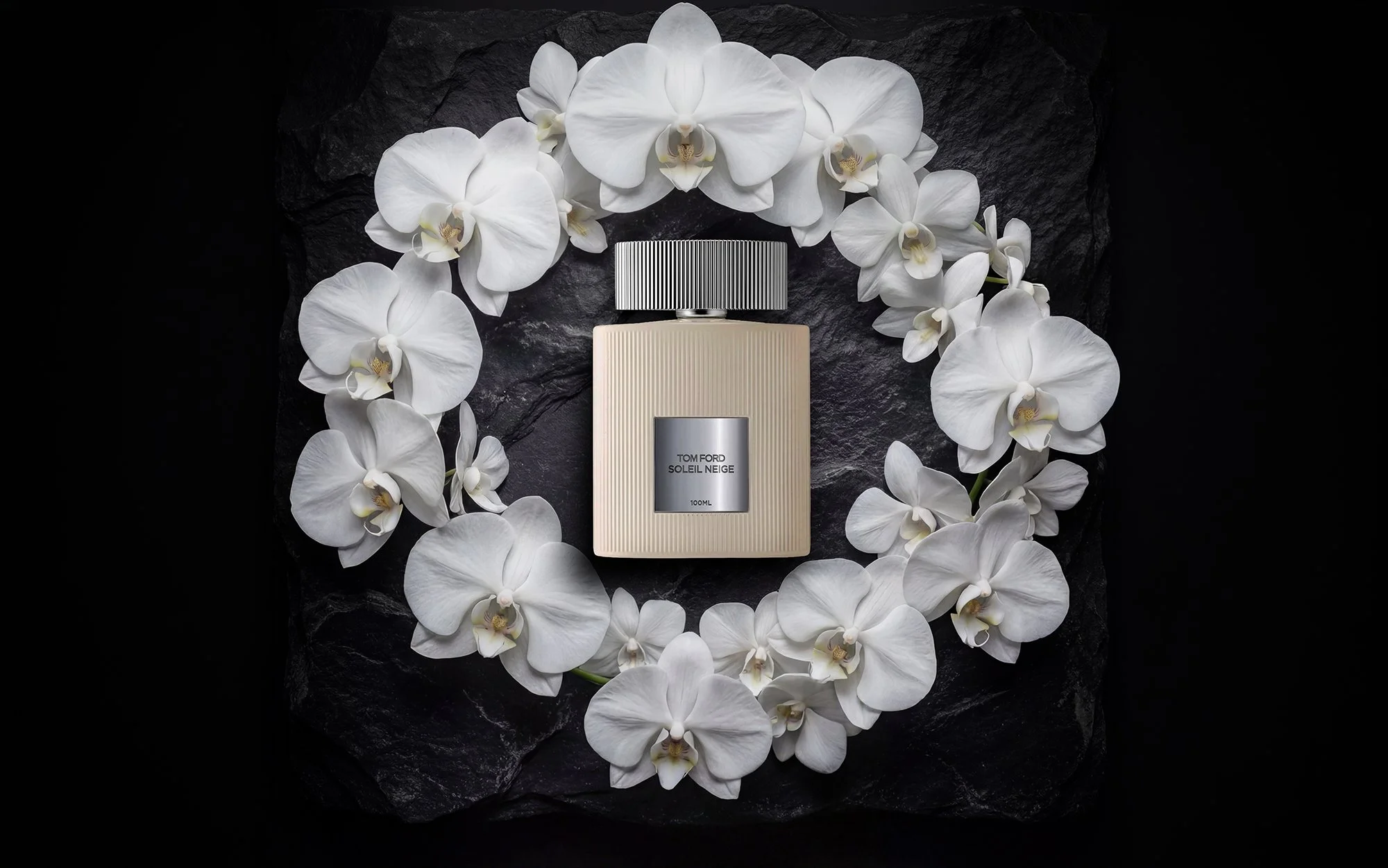 Perfume with orchid flowers