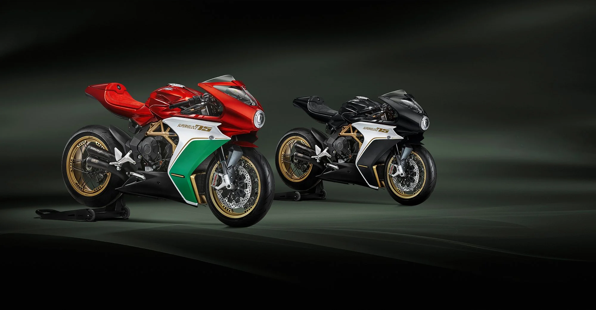 Two motor bikes in a studio scene.