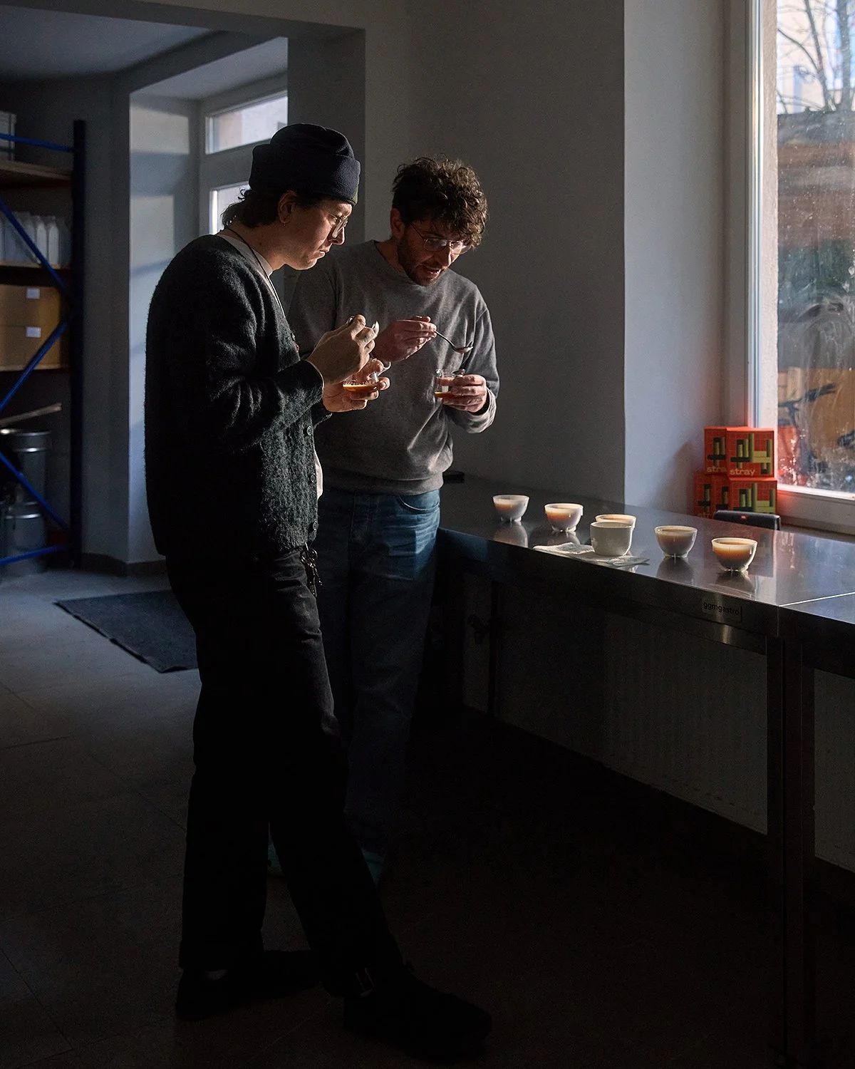 See you in a good light photography of baristas cupping