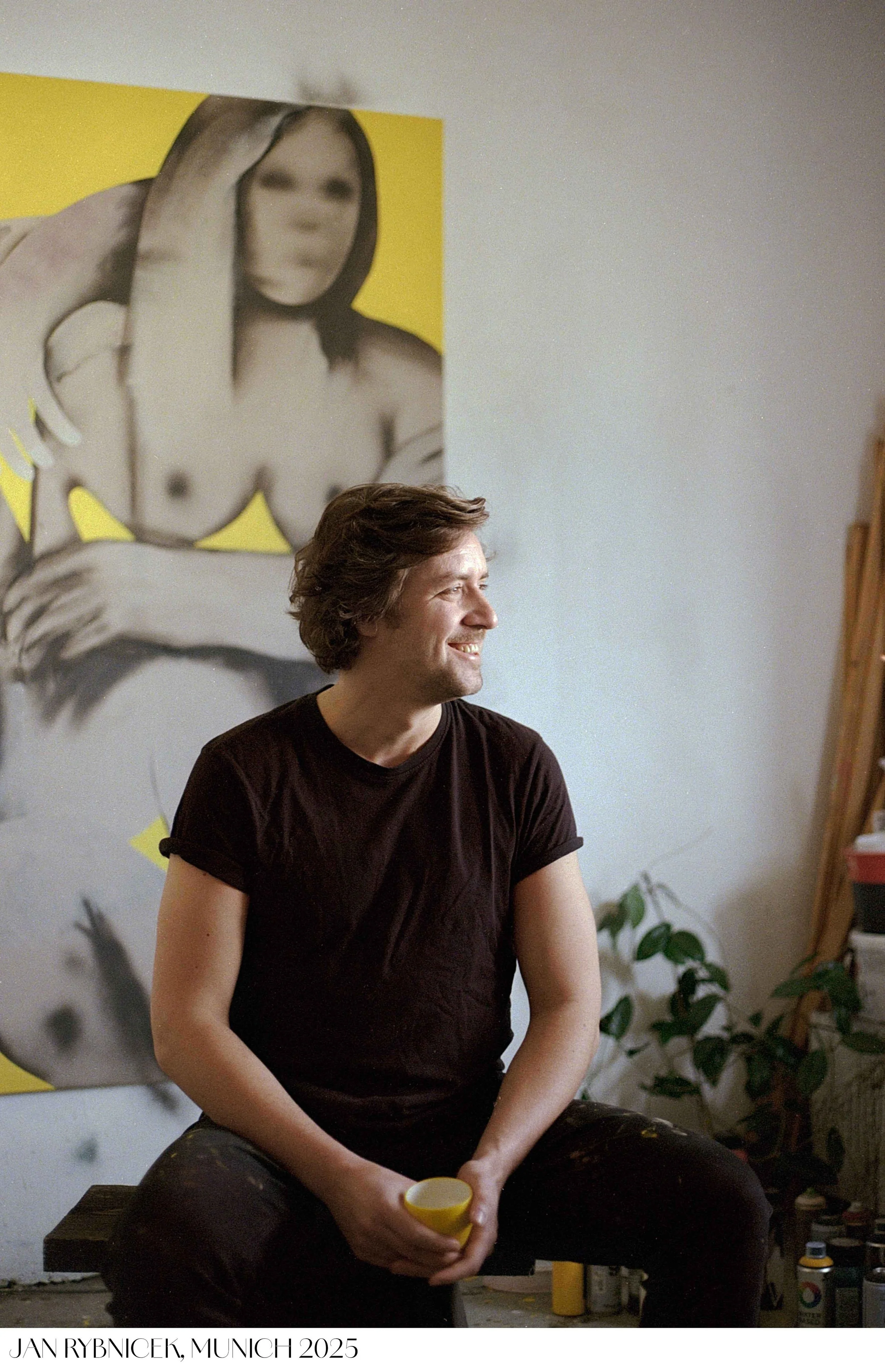 Portrait of a painter Jan Rybnicek sitting in front of his canvas captured by Tereza Konarikova See you in a good light photography