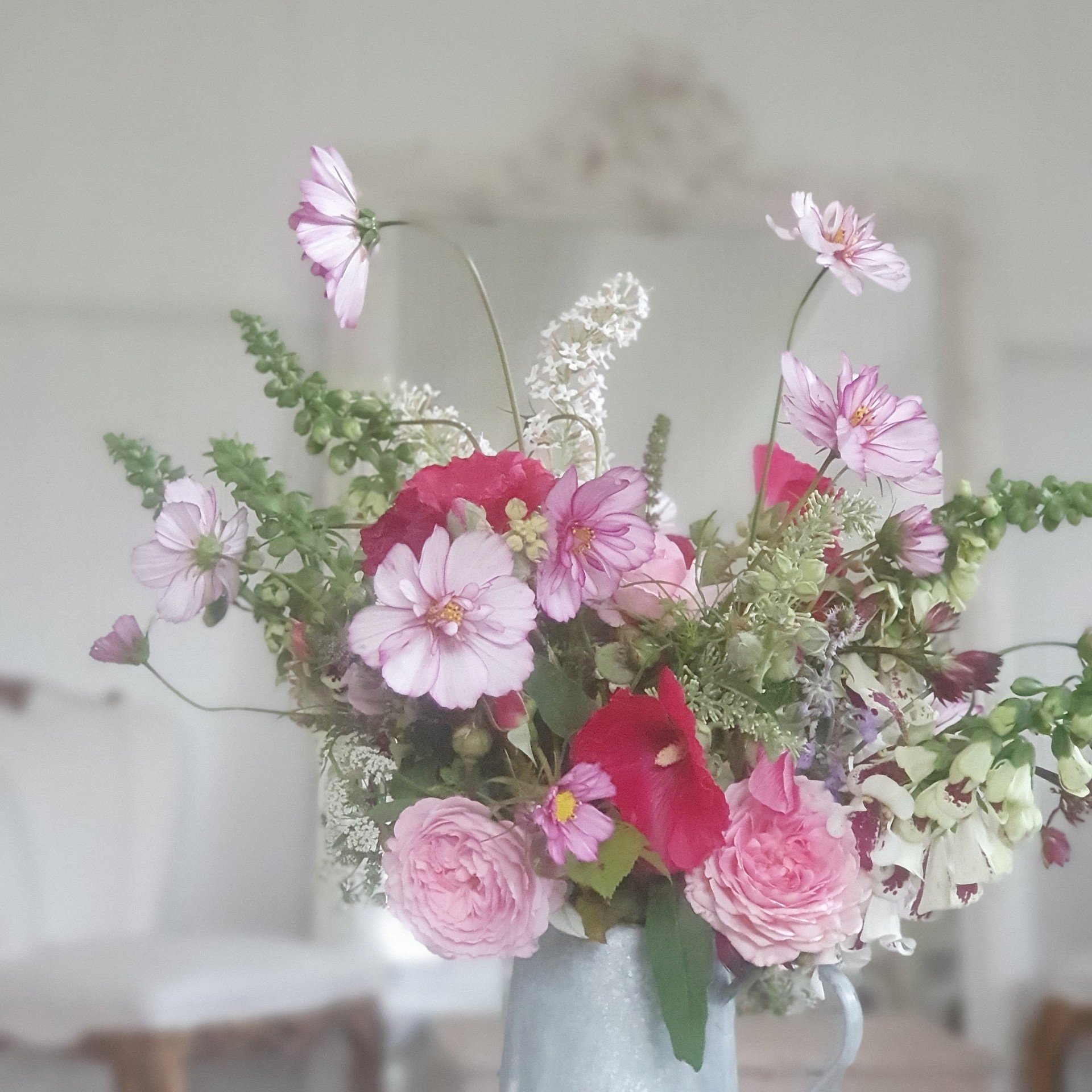Jug of flowers cosmos.jpg