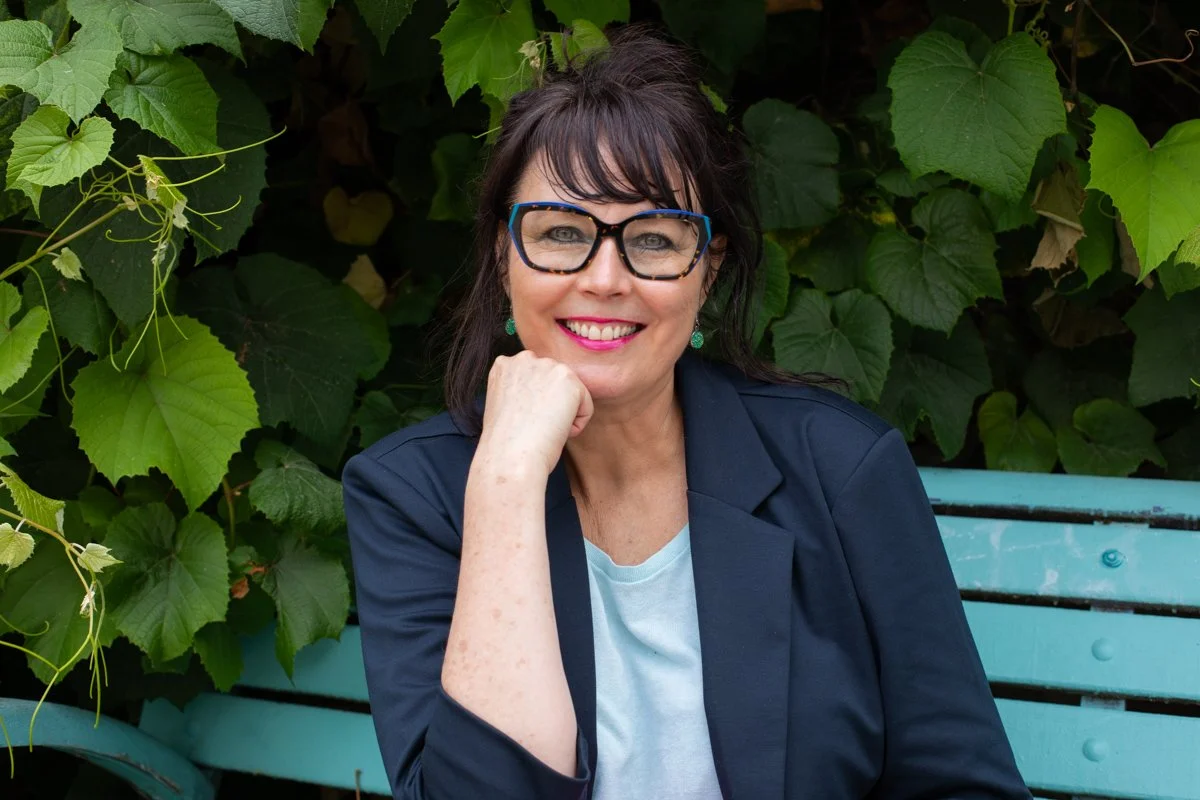 Paris bench woman's business headshot