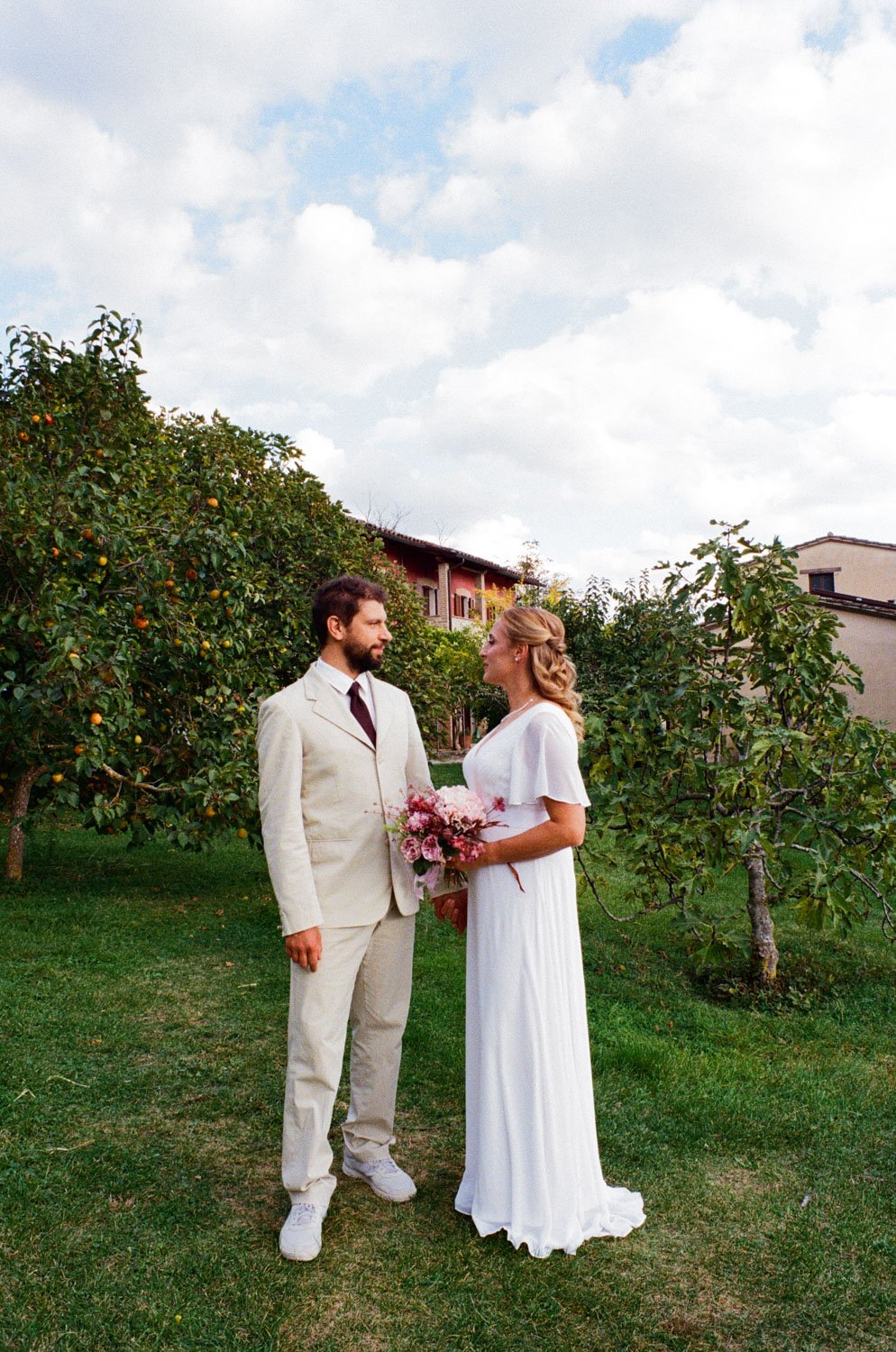 Bride and Groom in orchard Umbria - 1