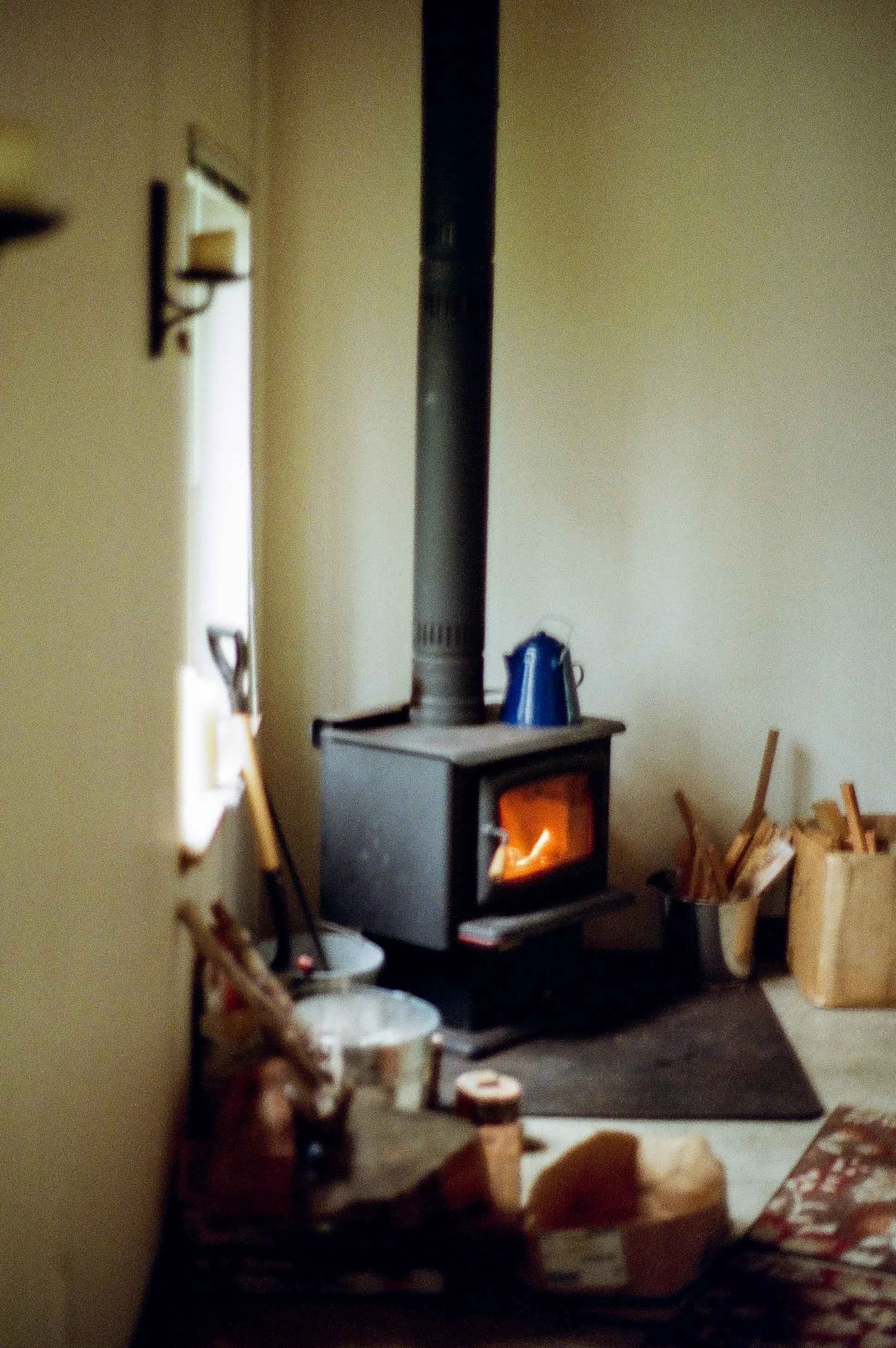 British Columbia cabin wood stove interior film photos