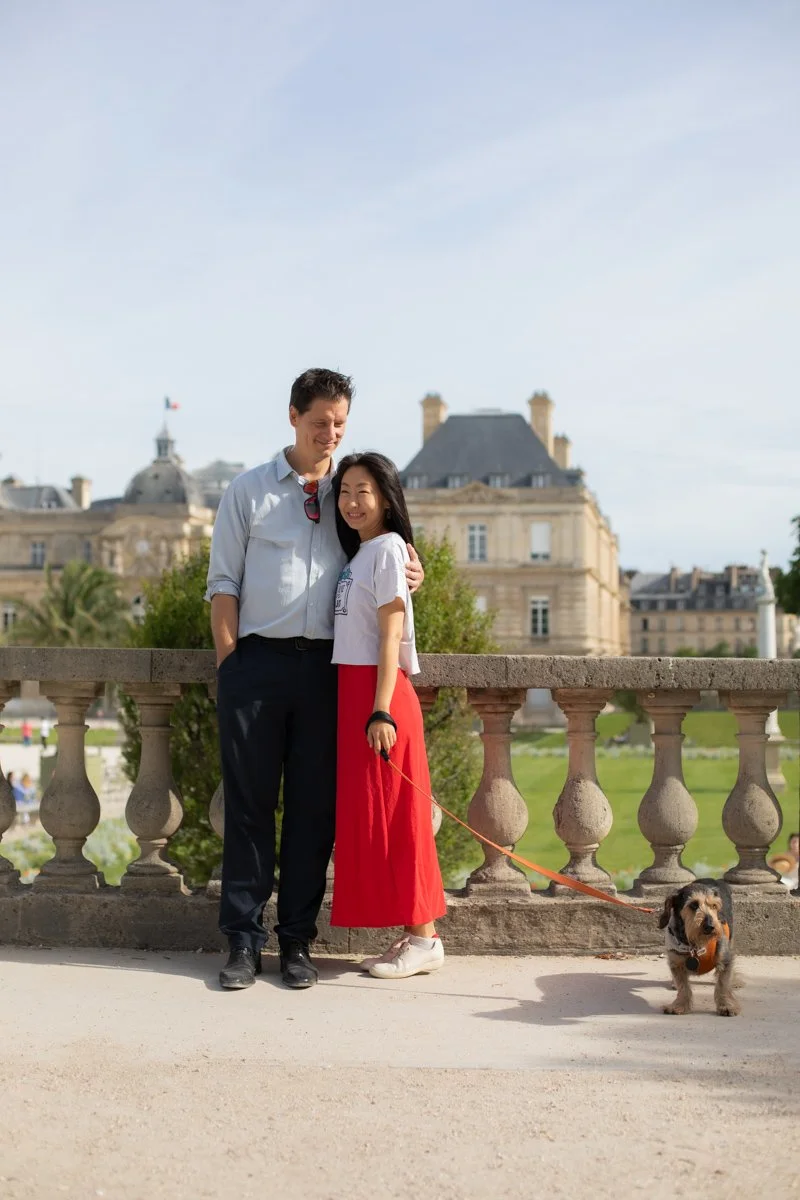 Couple and pup in luxembourg gardens