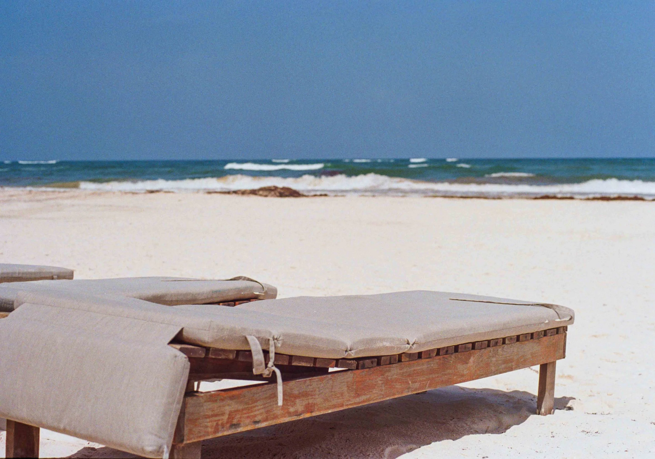Tulum hotel beach sun loungers film photos