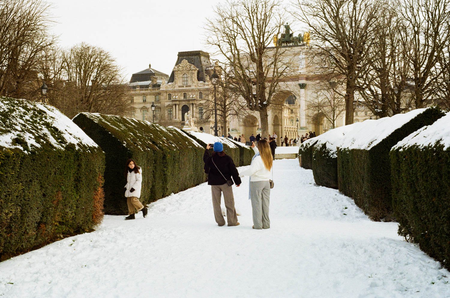 Posing for pictures Tuileries snow