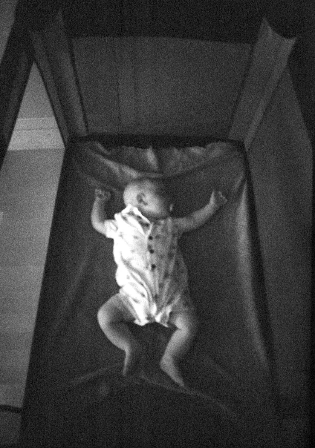 baby in cot film