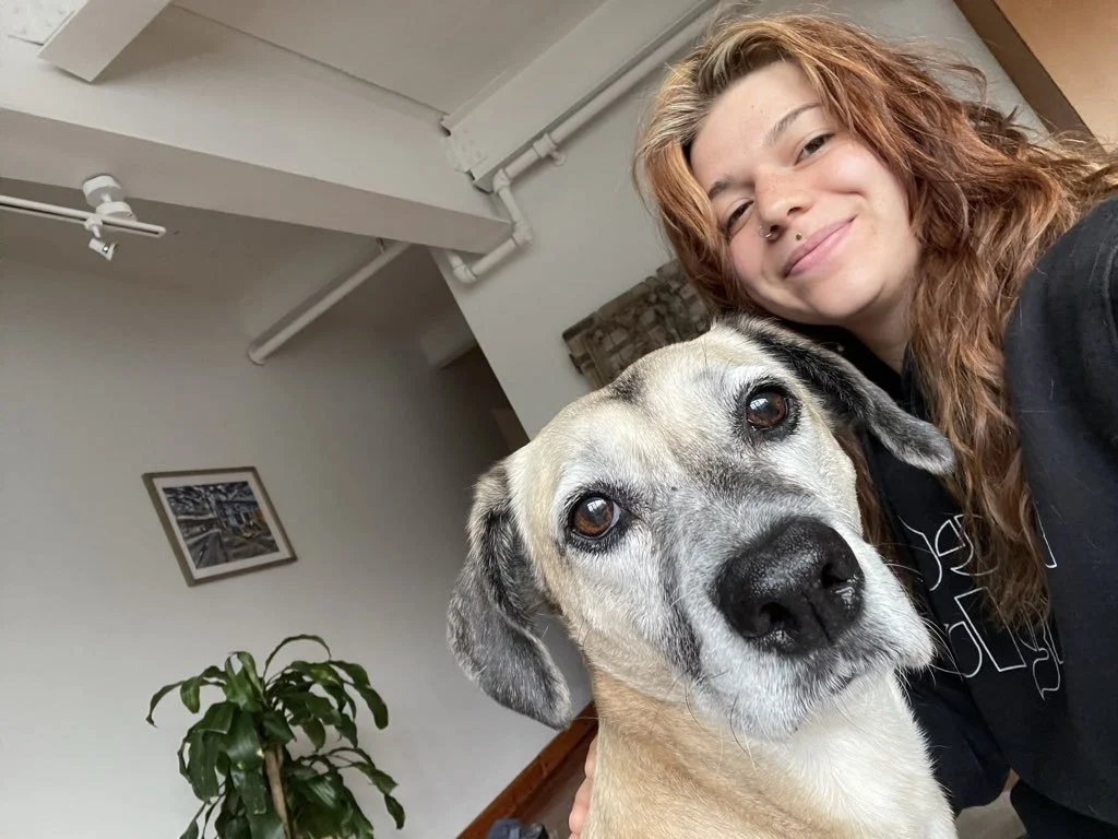 Happy senior dog with pet sitter in Asheville