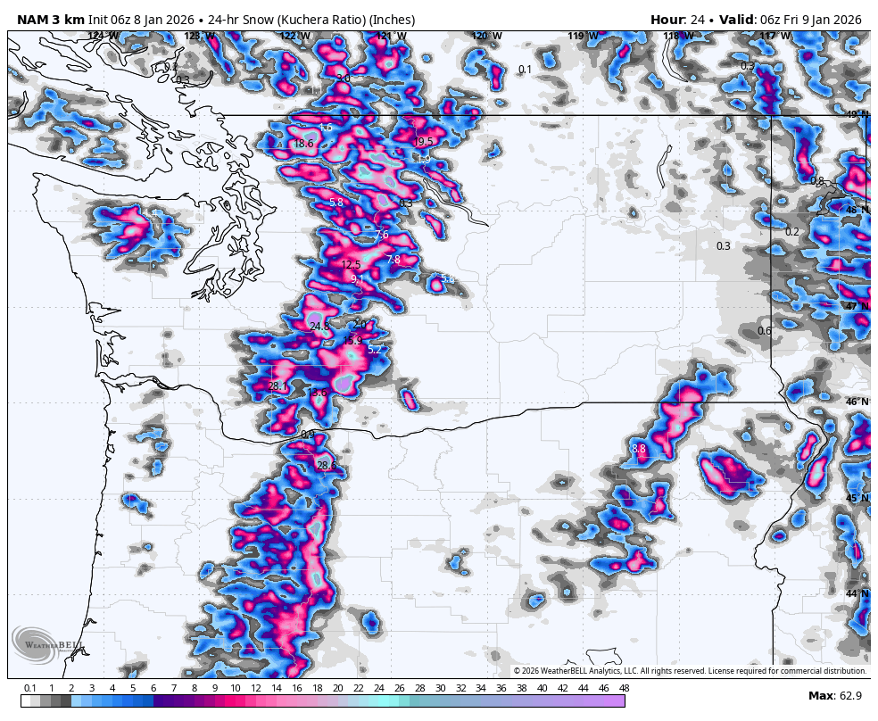 Weather map showing 24-hour snowfall forecast across the northern United States, with areas of heavy snowfall indicated by pink and purple colors, and lighter snow in blue. The map includes state boundaries, latitude and longitude lines, and snow accumulation amounts in inches.