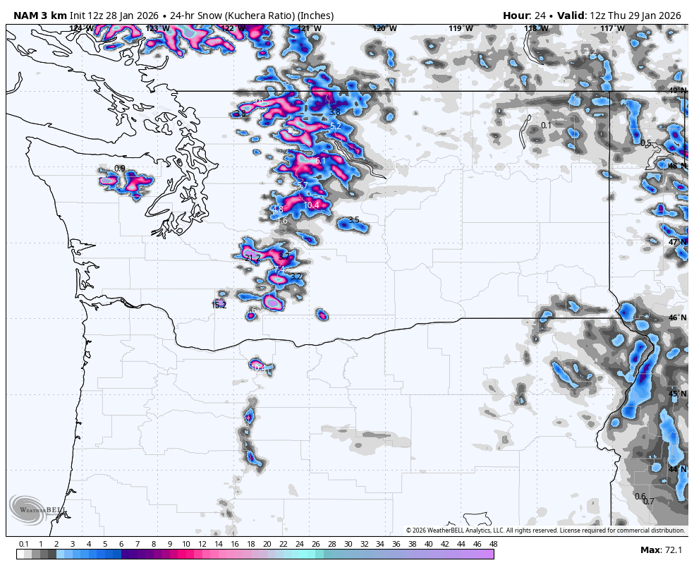 Weather map showing 24-hour snowfall in inches across parts of the Pacific Northwest, Idaho, and Montana, with heavier snowfall indicated in pink and purple colors.