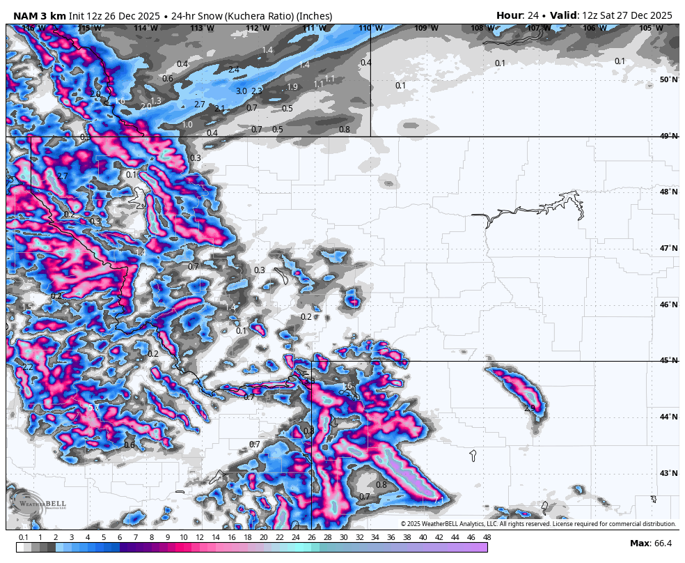 A weather map showing snowfall amounts across parts of the Pacific Northwest, Northern Rockies, and Northern Plains on Saturday, December 27, 2025. The map uses different shades of pink, blue, and gray to indicate varying levels of snow in inches, with some areas experiencing over 20 inches of snowfall.