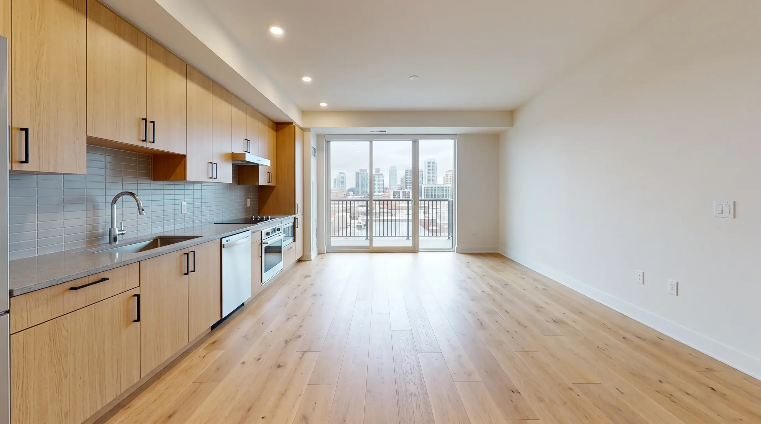 Interior of a condominium unit showing flooring, built-in cabinets and countertops, the items Florida statute makes the unit owner's responsibility rather than the master policy's