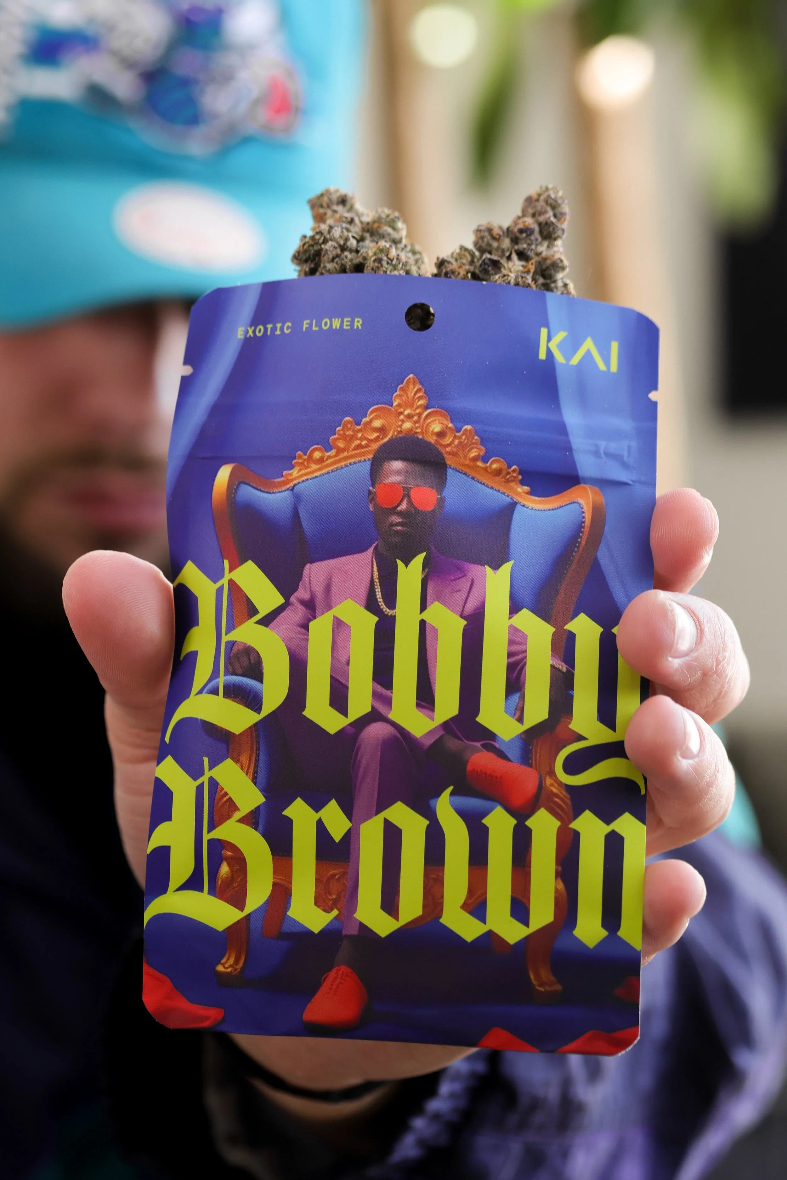 KAI Cultivation Bobby Brown Indica Pre-Pack with Bud being held