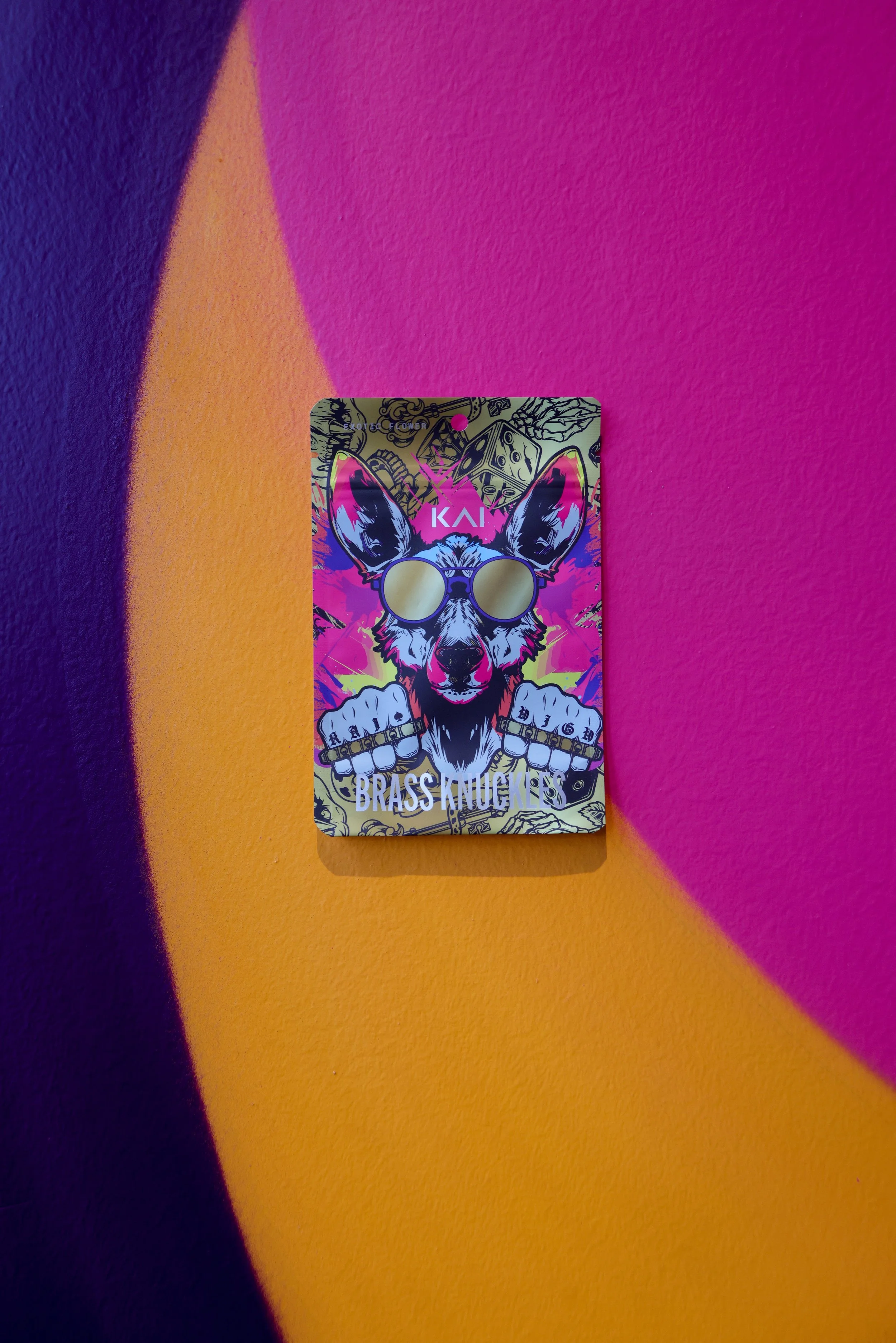 KAI Cultivation Brass Knuckles Eighth Package on Graffiti Wall