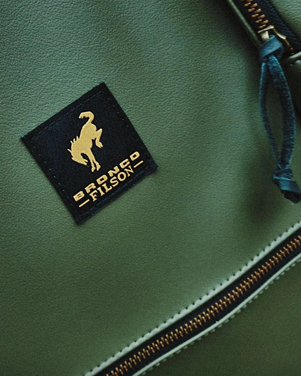 Detail Shot of vinyl material and woven label on accessory bag