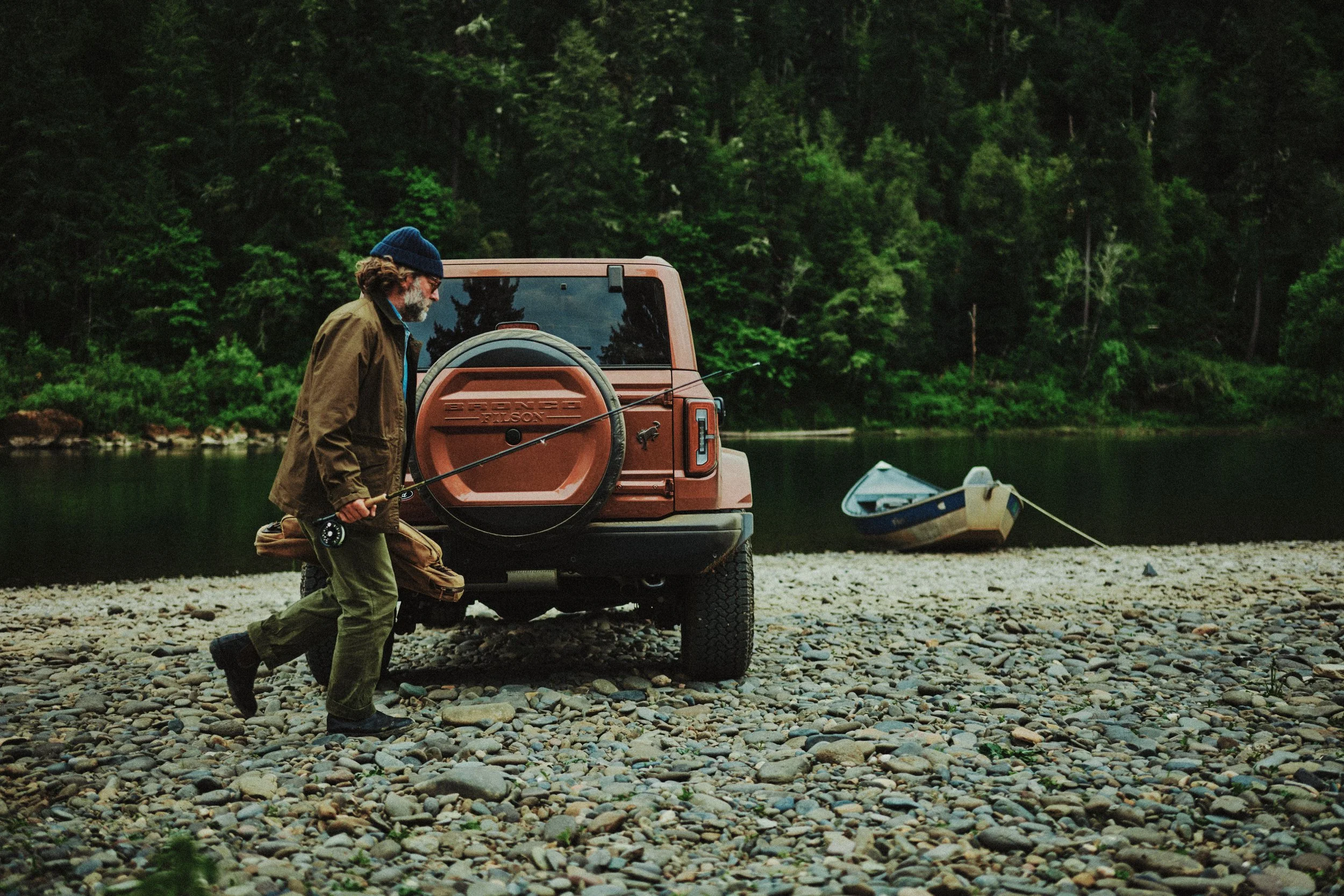 Lifestyle shot of fisherman with back of Bronco Filson First Edition