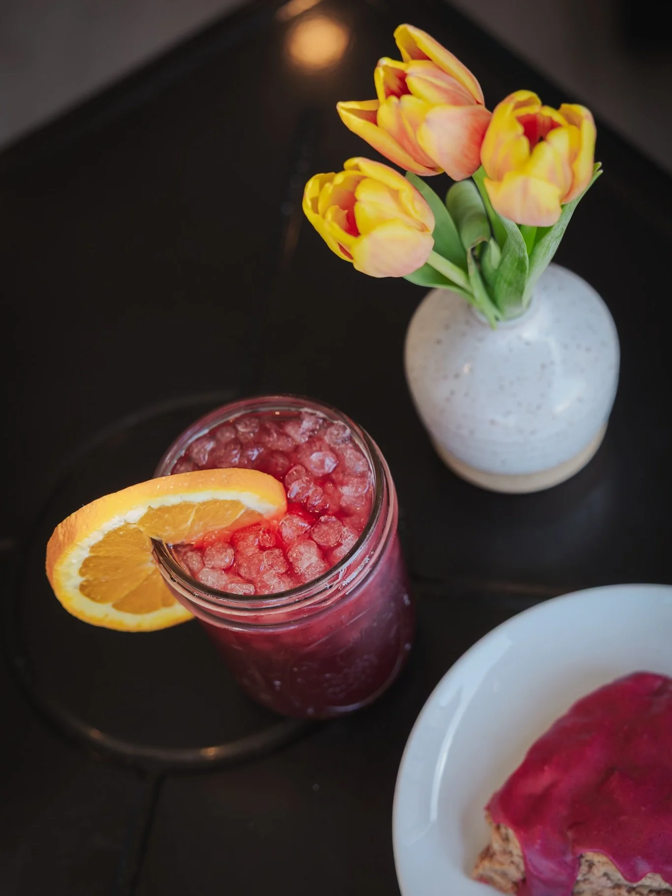 Singing In The Rain ~ Iced Hibiscus-Mint Tea with our housemade Orange Syrup🌺