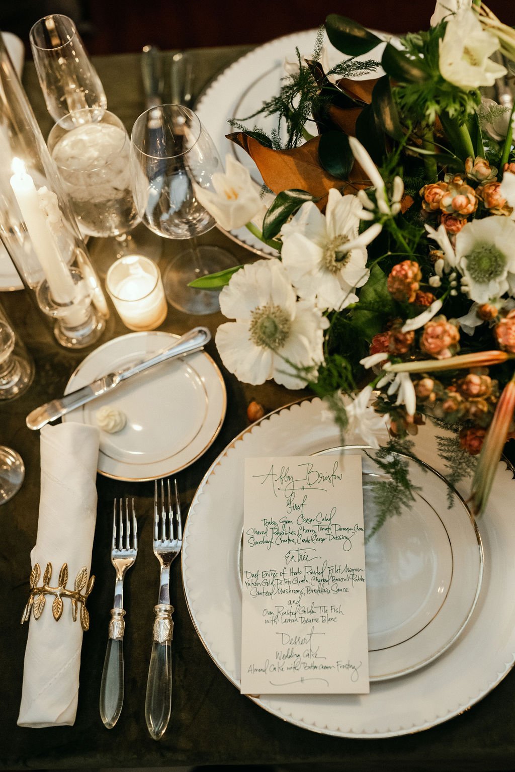 Close-up of a formal dinner table setup with white china, gold-accented cutlery, and a handwritten menu.
Anne Rhett Photography
Swell Botanics
The Dewberry Hotel
Technical Event Company (TEC)
BBJ La Tavola
Snyder Events
Emerson James Rentals
Charlest