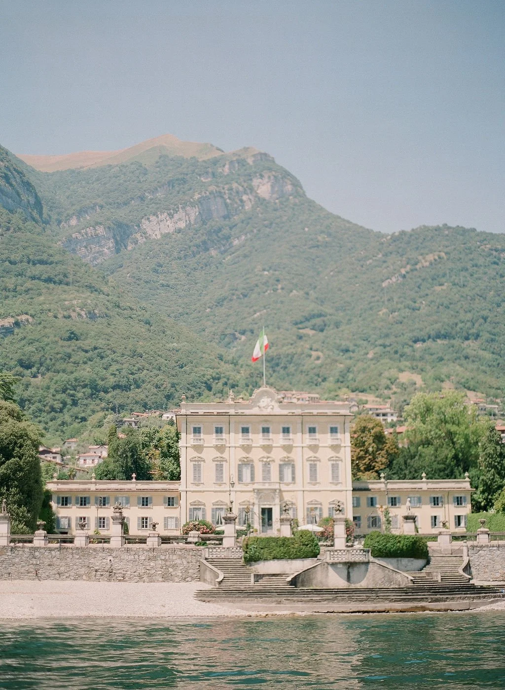 Lake Como villa wedding venue framed by mountains and water for an Italy destination wedding weekend.