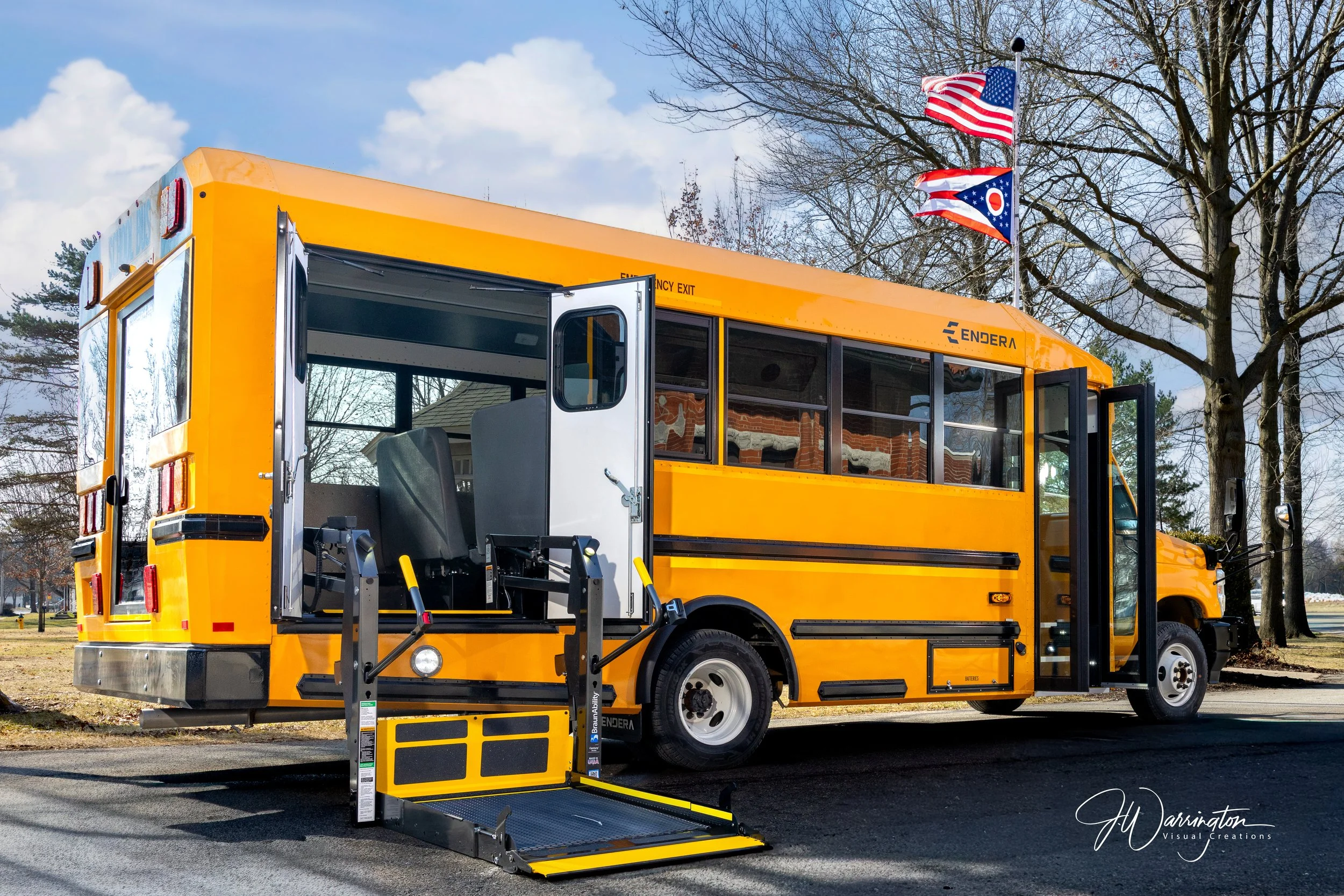 Yellow school bus on a bright day, showing the flexibility of the lift gate captured by  Northwest Ohio photographer