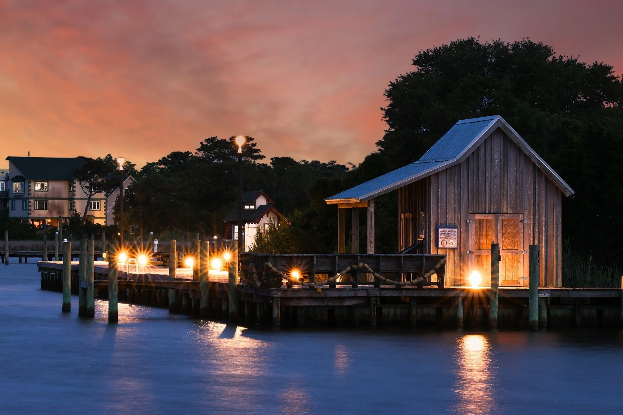 stunning landscape photography of lit up dock at dusk by northwest ohio photographer