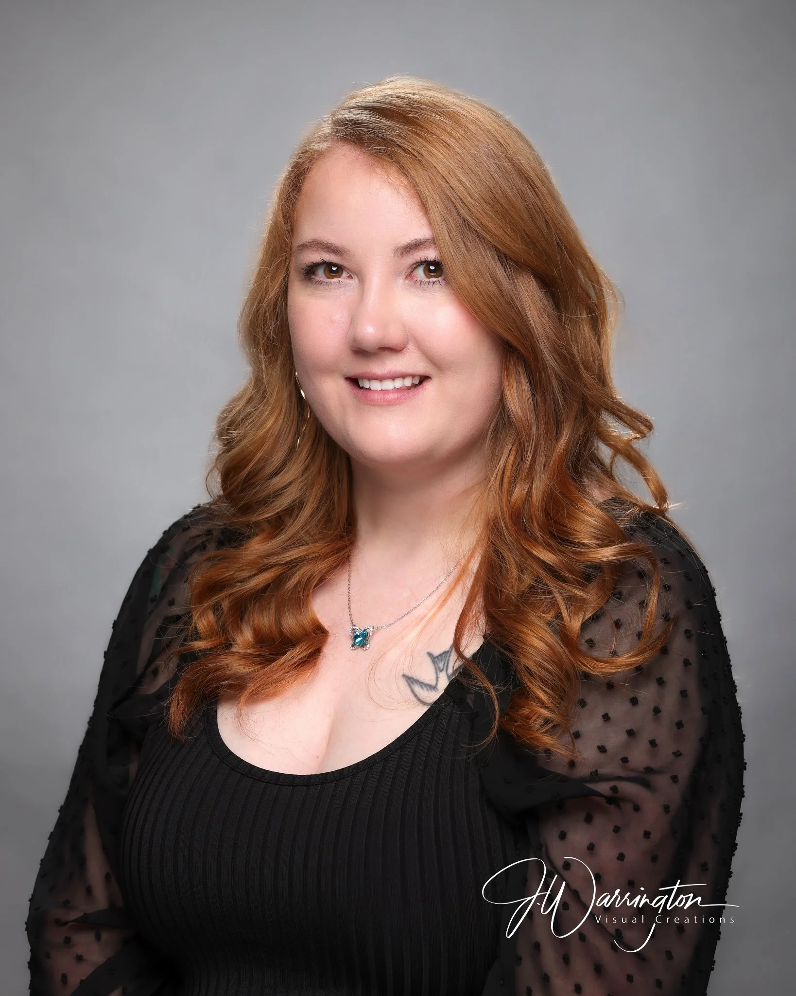 Pretty red hair professional black blouse headshot northwest ohio photographer