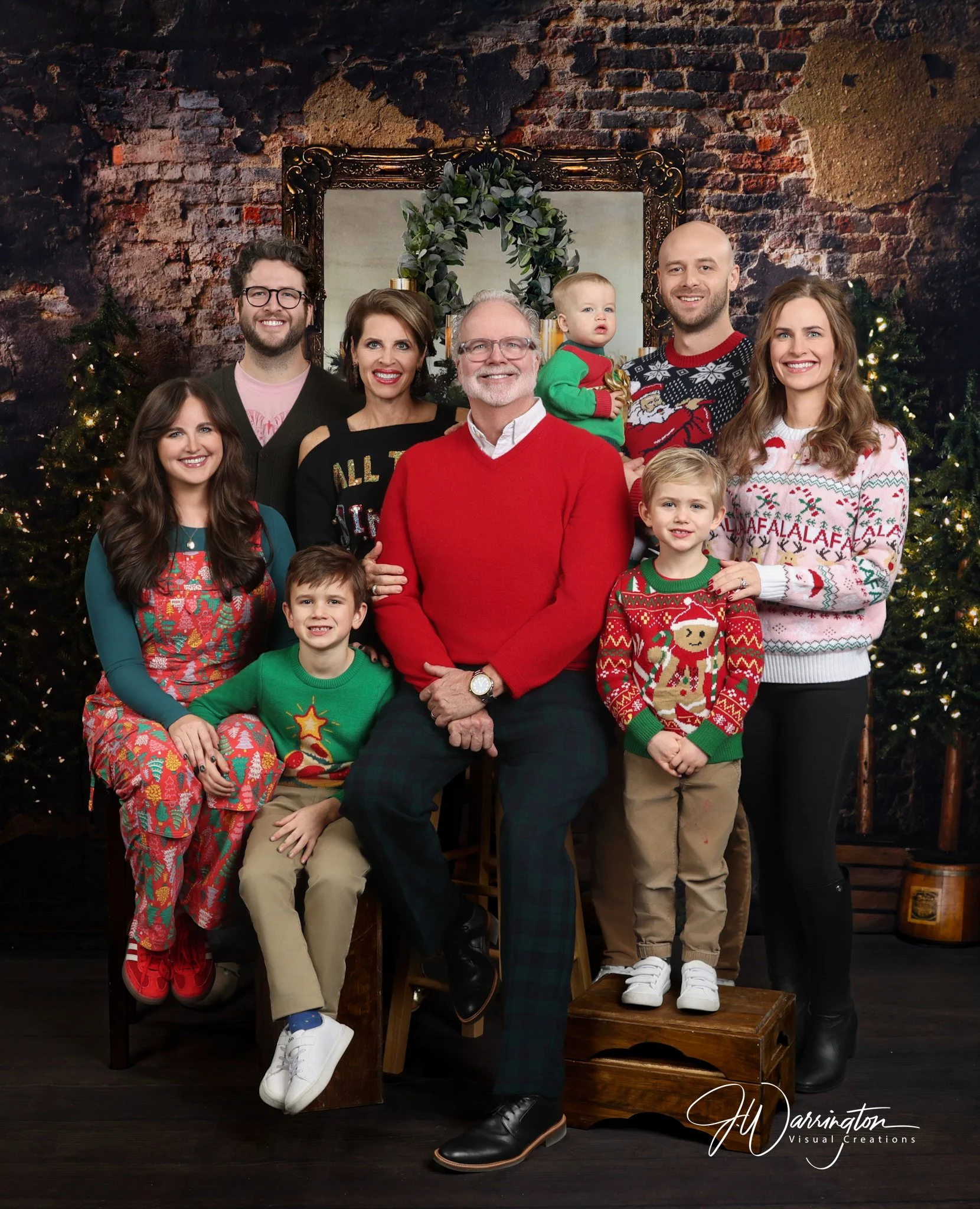 Large group family photos with rustic holiday background scheme by a Northwest Ohio photographer