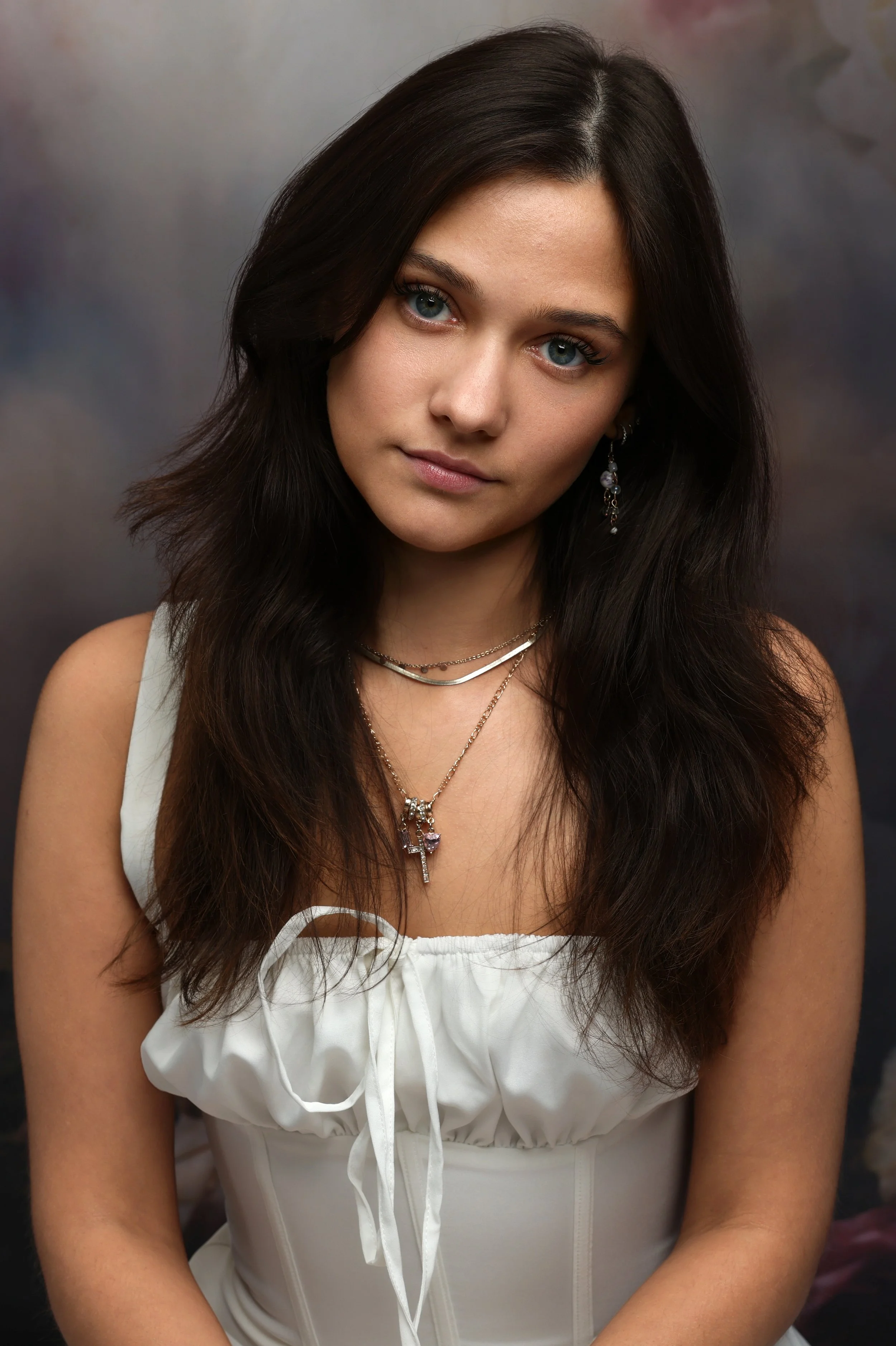 Studio portrait of a beautiful teenage girl with long brown hair, captured by northwest ohio photographer 