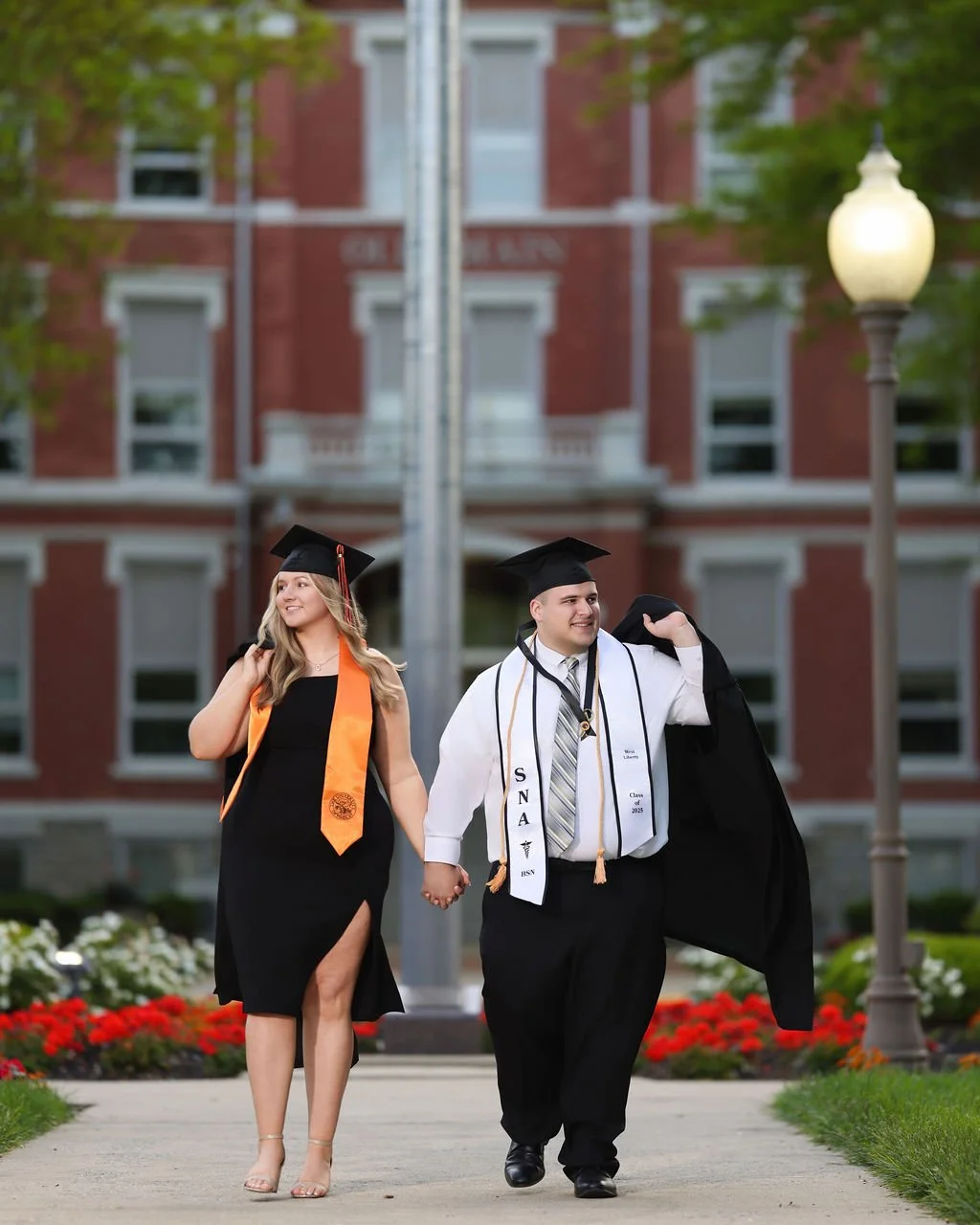 College couple holding hands during photoshoot captured by northwest ohio photographer
