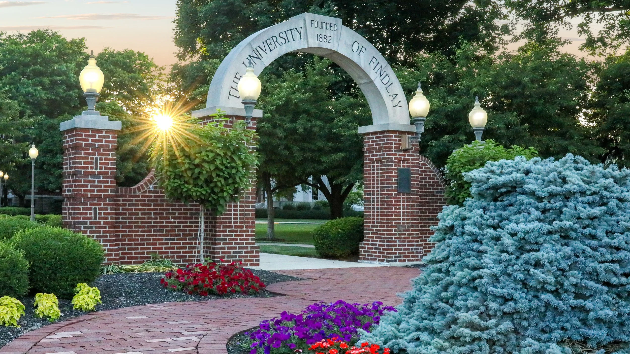 University of Findlay brick entrance arch at golden hour in Findlay, Ohio, captured by northwest ohio photographer