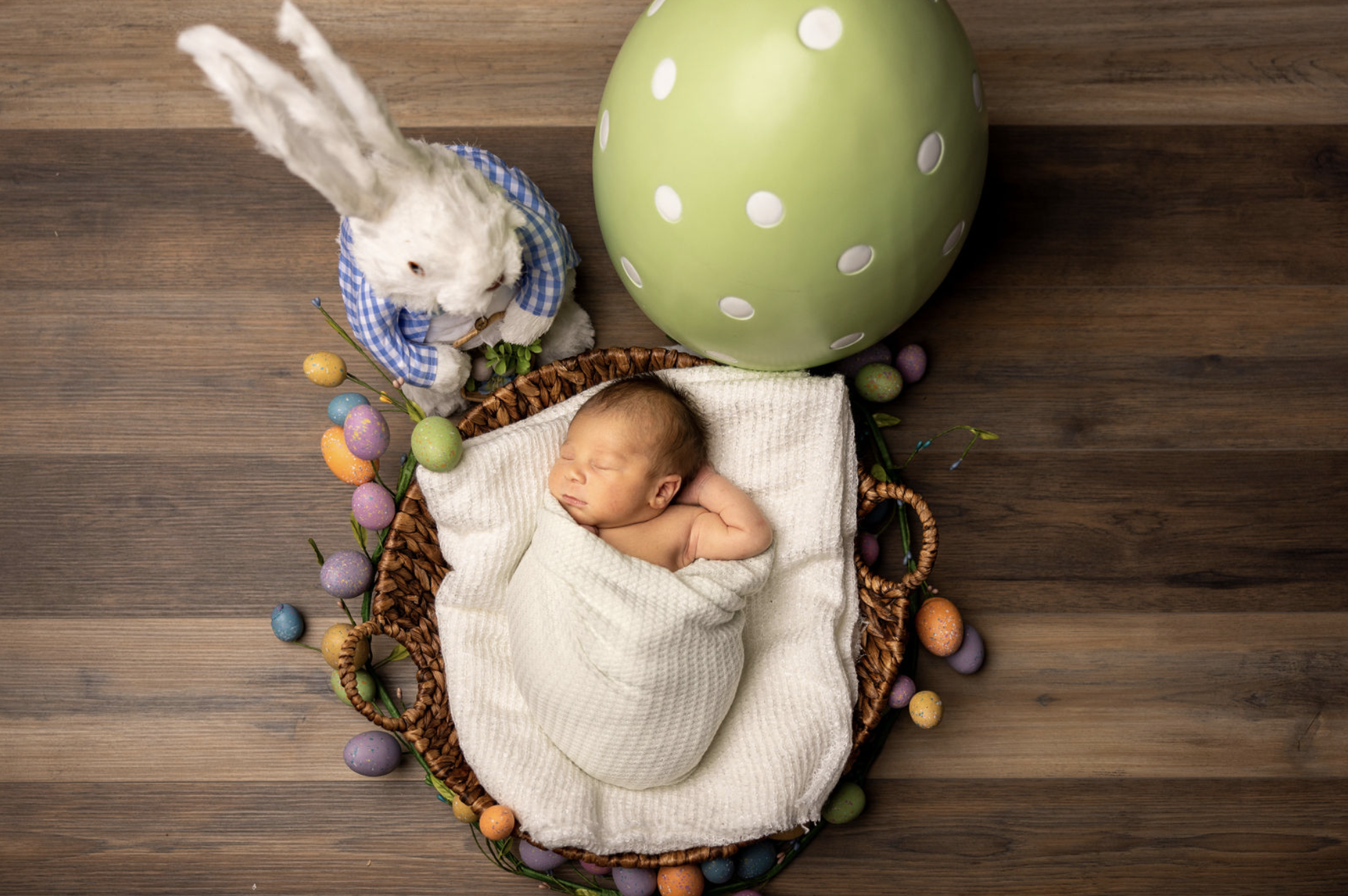 Sleeping baby photography with easter decor