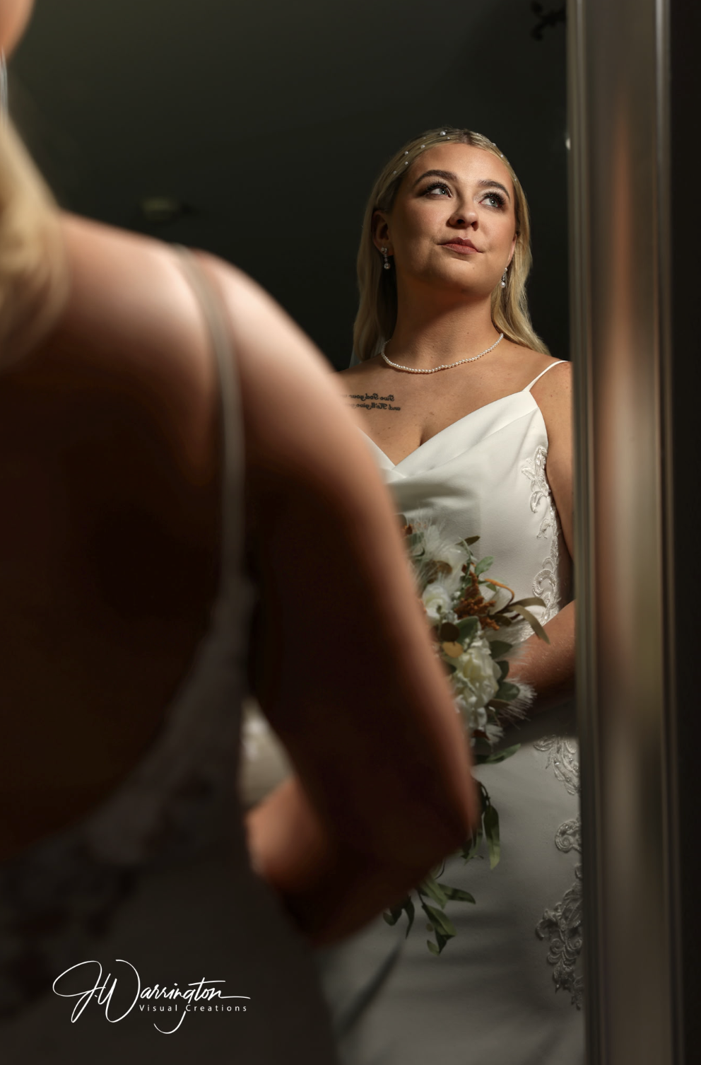 Gorgeous first look bride with pearl necklace and pearls in hair photography by Findlay photographer