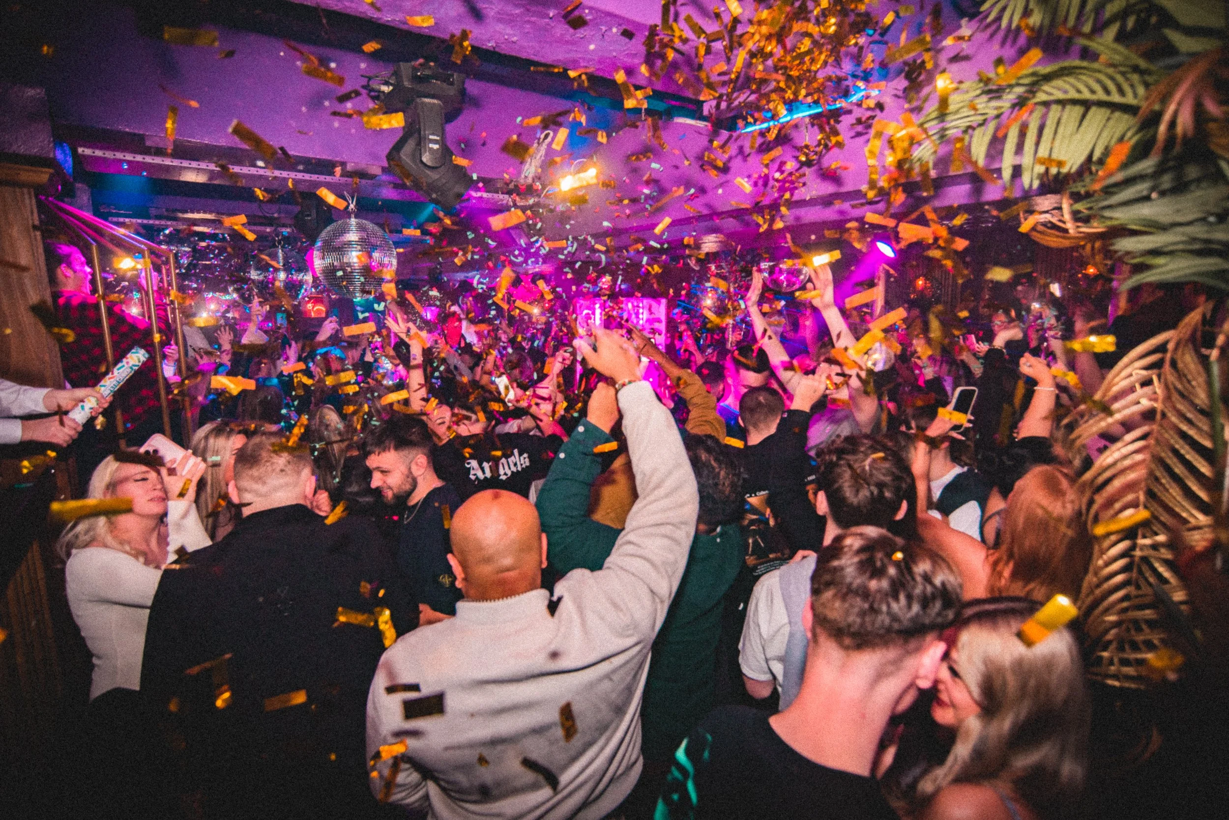 Leicester New Year celebration, guests dancing in confetti