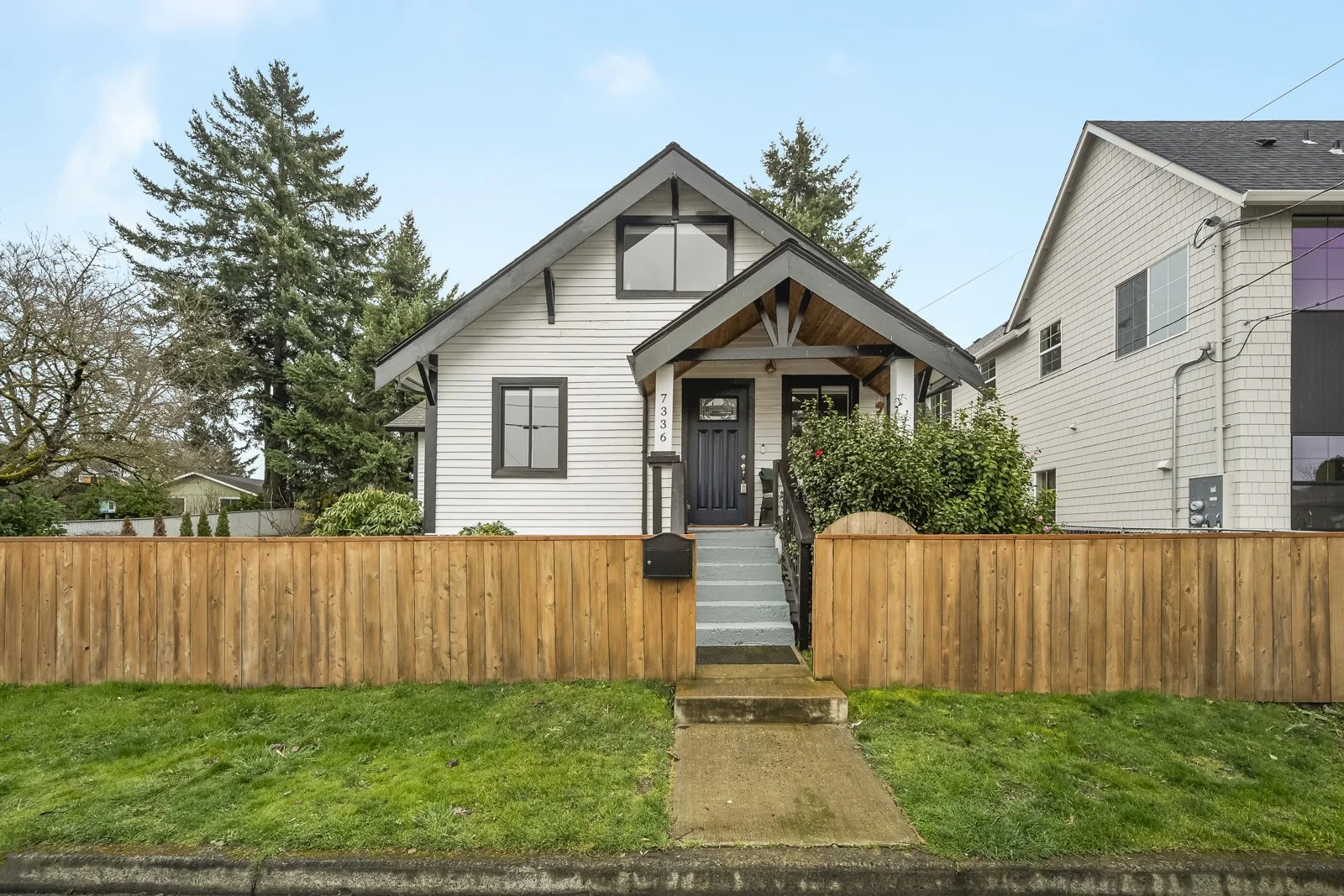 Sprawling Yard for This Cheerful Farmhouse