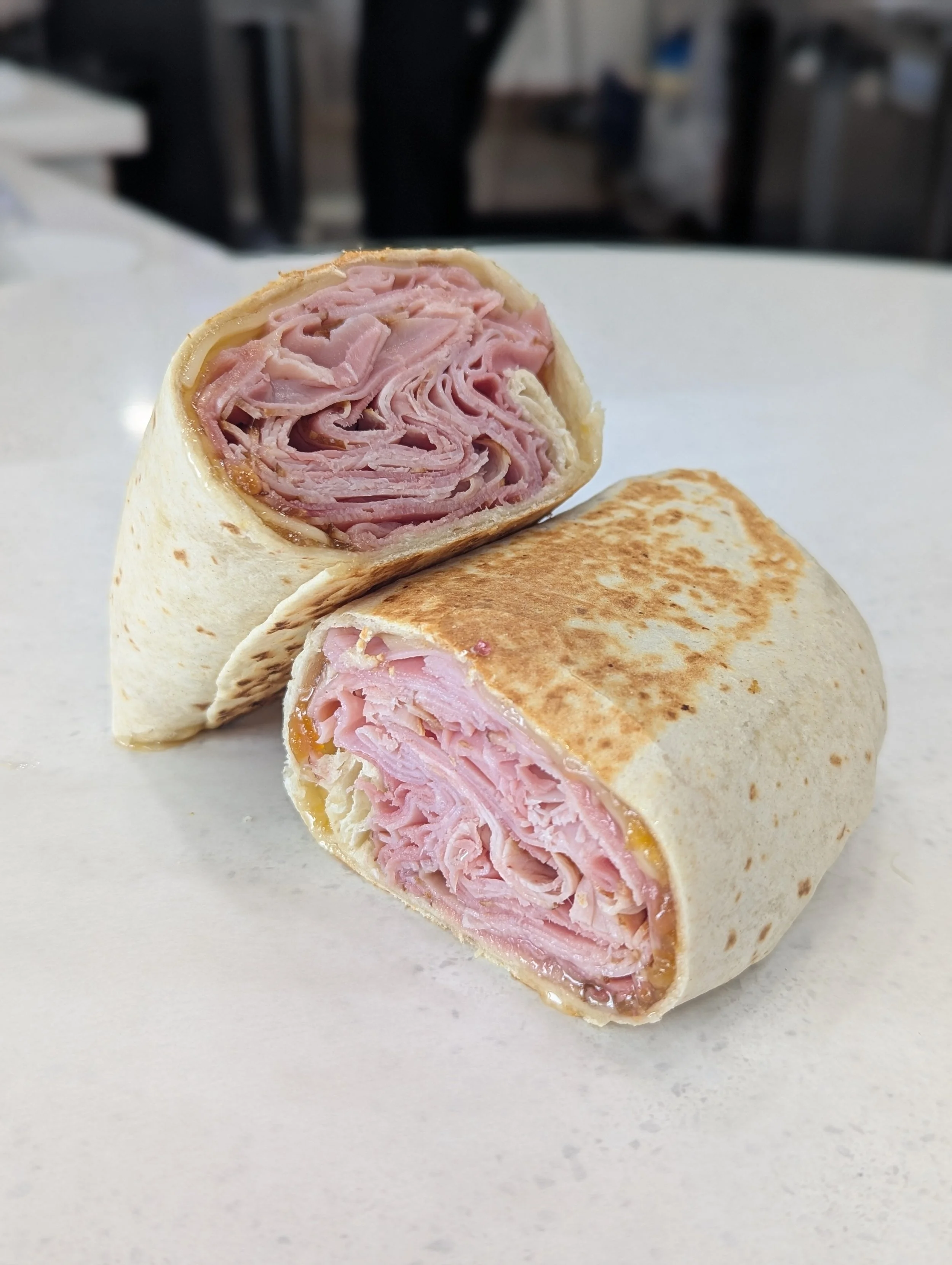 M-Chez Hammer Wrap
Honey smoked ham, Swiss cheese, peach jam