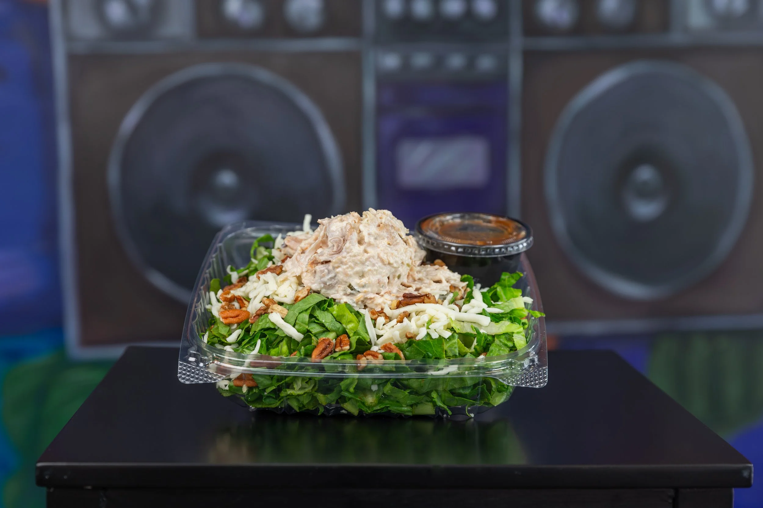 Purple Haze Salad
Lettuce, chicken salad, shredded mozzarella, crumbled pecans, apple butter jam, vinaigrette