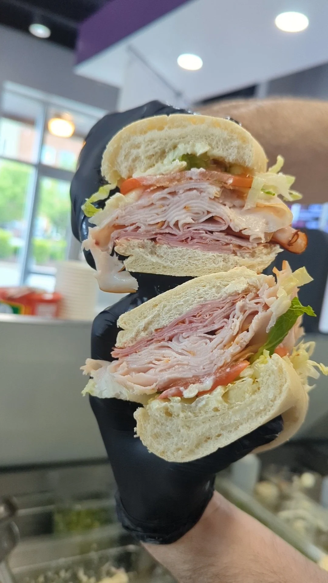 Hammy Sagar Club Sandwich:
Turkey breast, honey smoked ham, bacon, white American cheese, lettuce, tomato, mayo