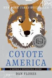 Cover of the book 'Coyote America' by Dan Flores, featuring a stylized illustration of a coyote's face, with the title and author's name displayed.