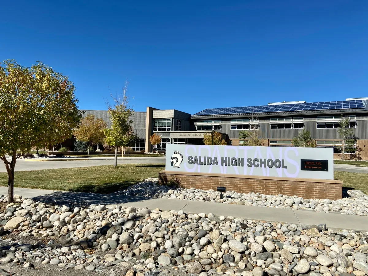 Geometric drawing of an outline square with sections divided by vertical, horizontal, and circle lines.