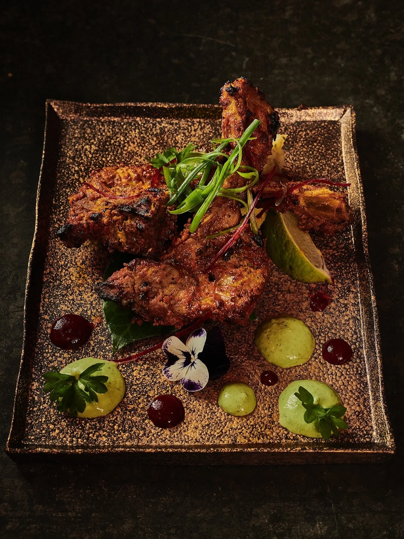 Lamb Chops or Seekh Kebabs? What is your go to order for  starters?

All of our meats are marinated overnight in our home ground spice blend, yoghurt &amp; rock salt and charred to perfection on our grills. Served alongside tangy chutneys like mint &