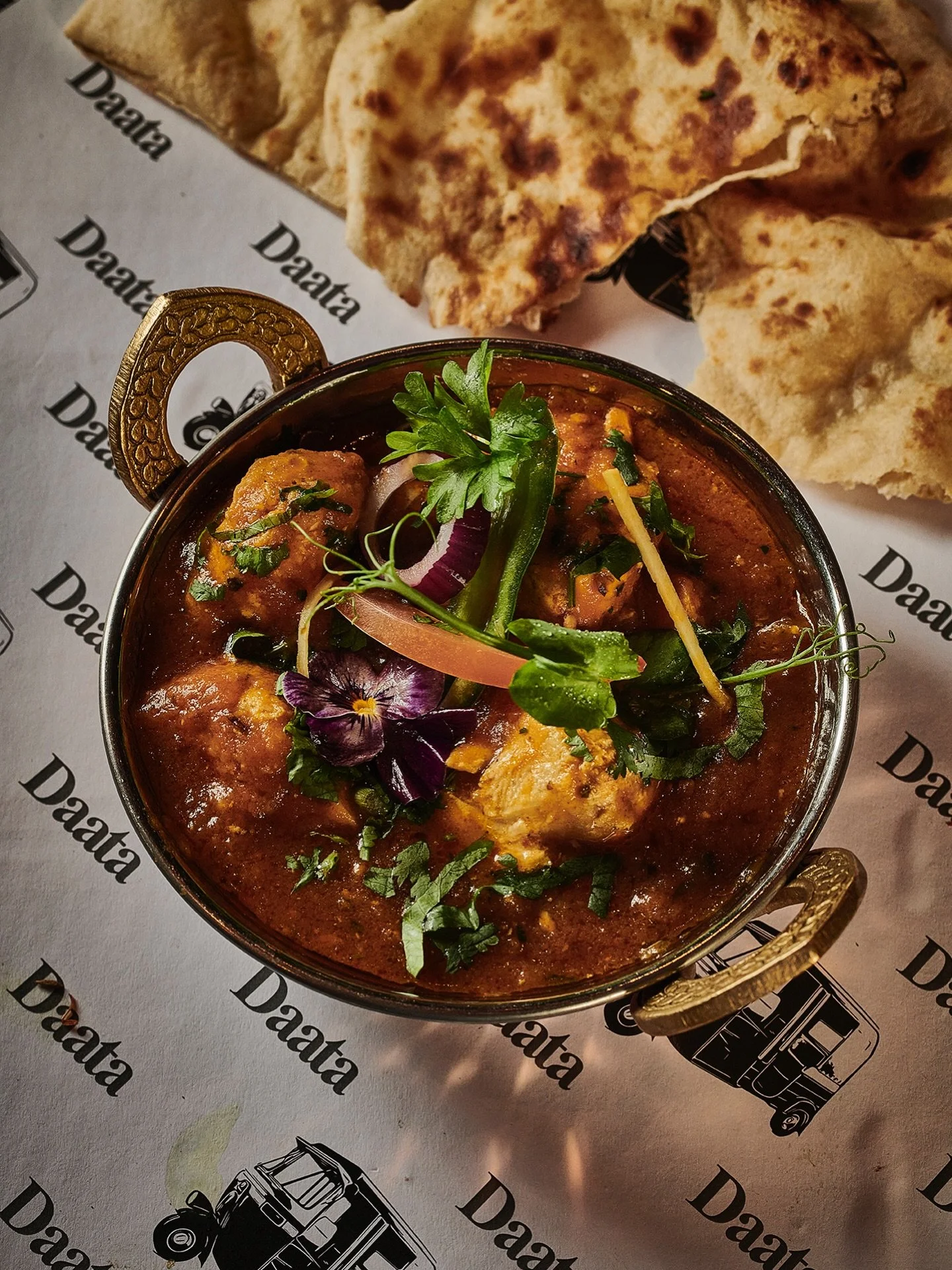 Garlic Chilli Chicken

Tender tandoor chicken simmered in a
spicy tomato based curry. A spice lover's dream dish.