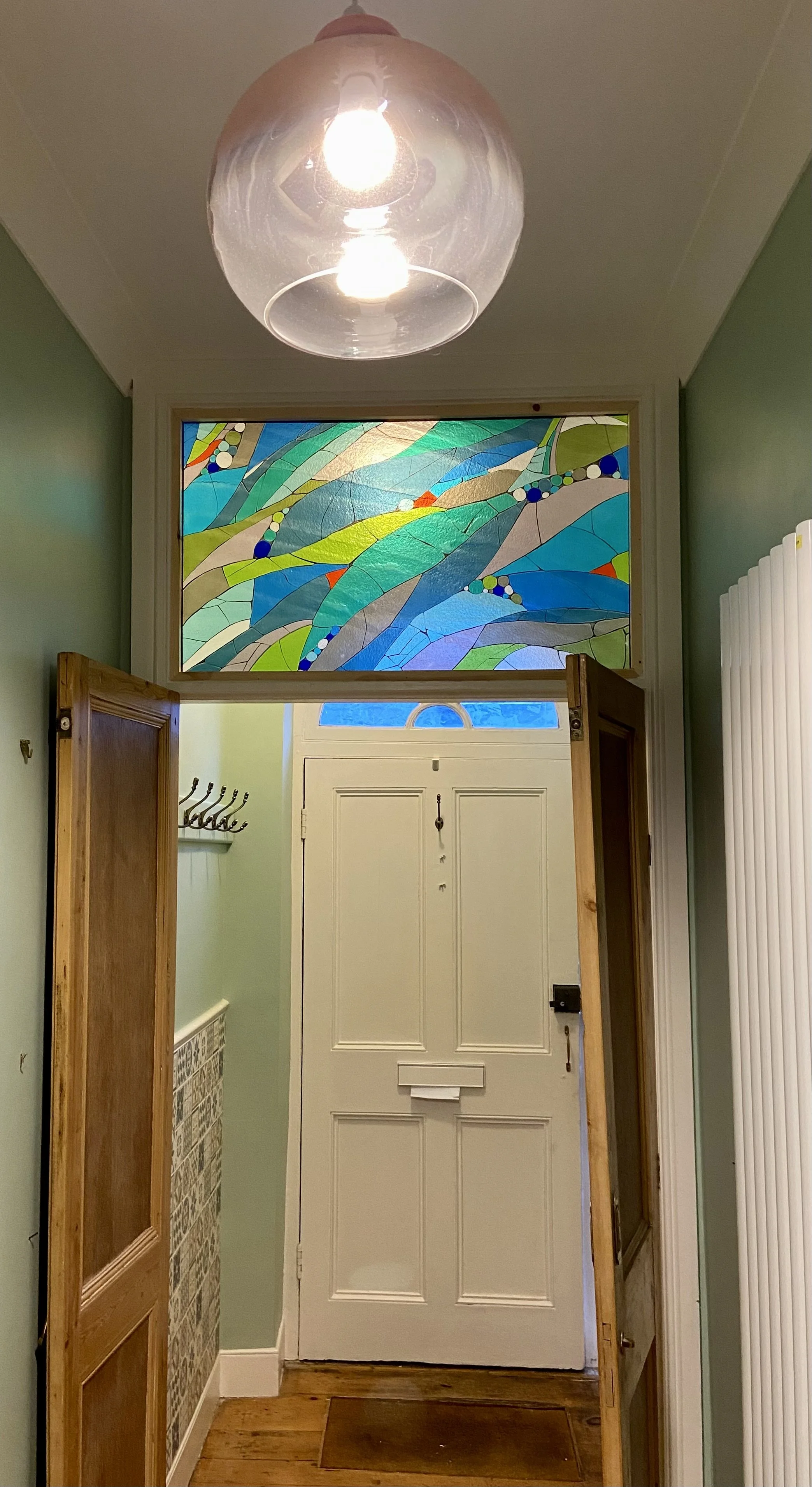 Architectural glass in hallway by Jo Vincent