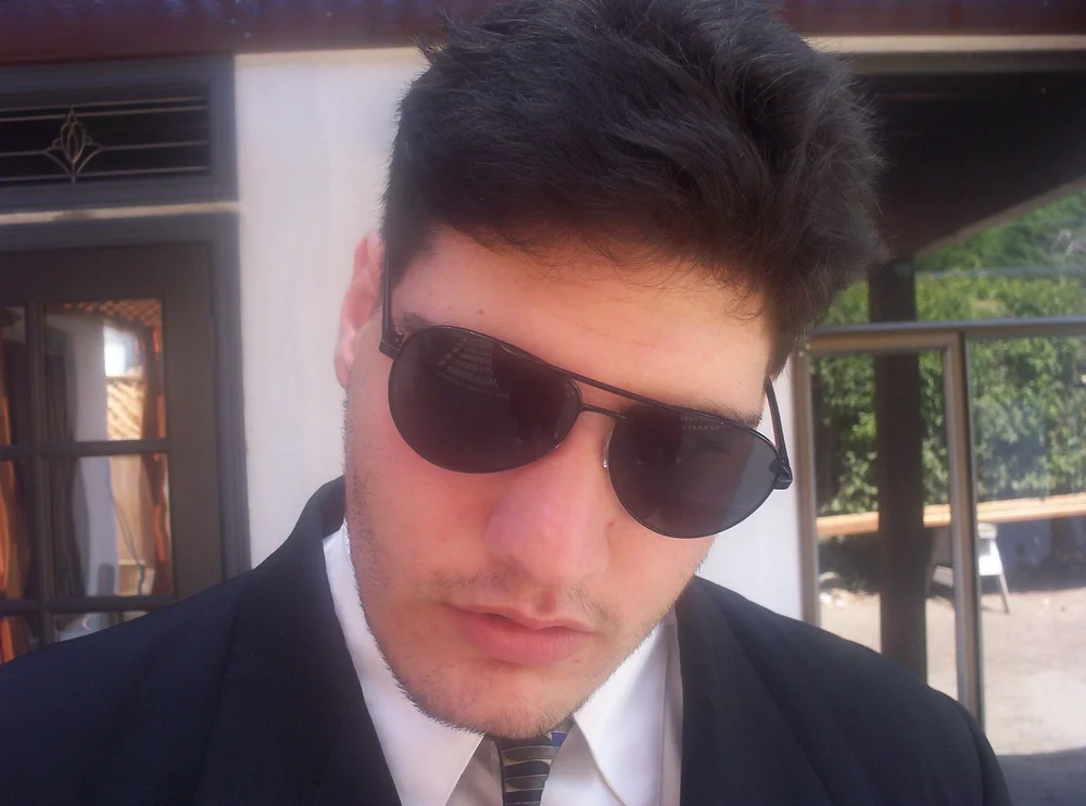 Ray Revello as Mr. Ray Revolver