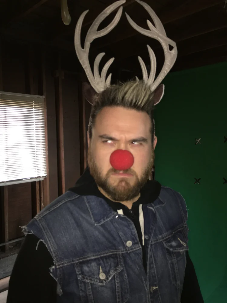 Becker Von Felsburg as Rudolph the Buff-Ass Reindeer