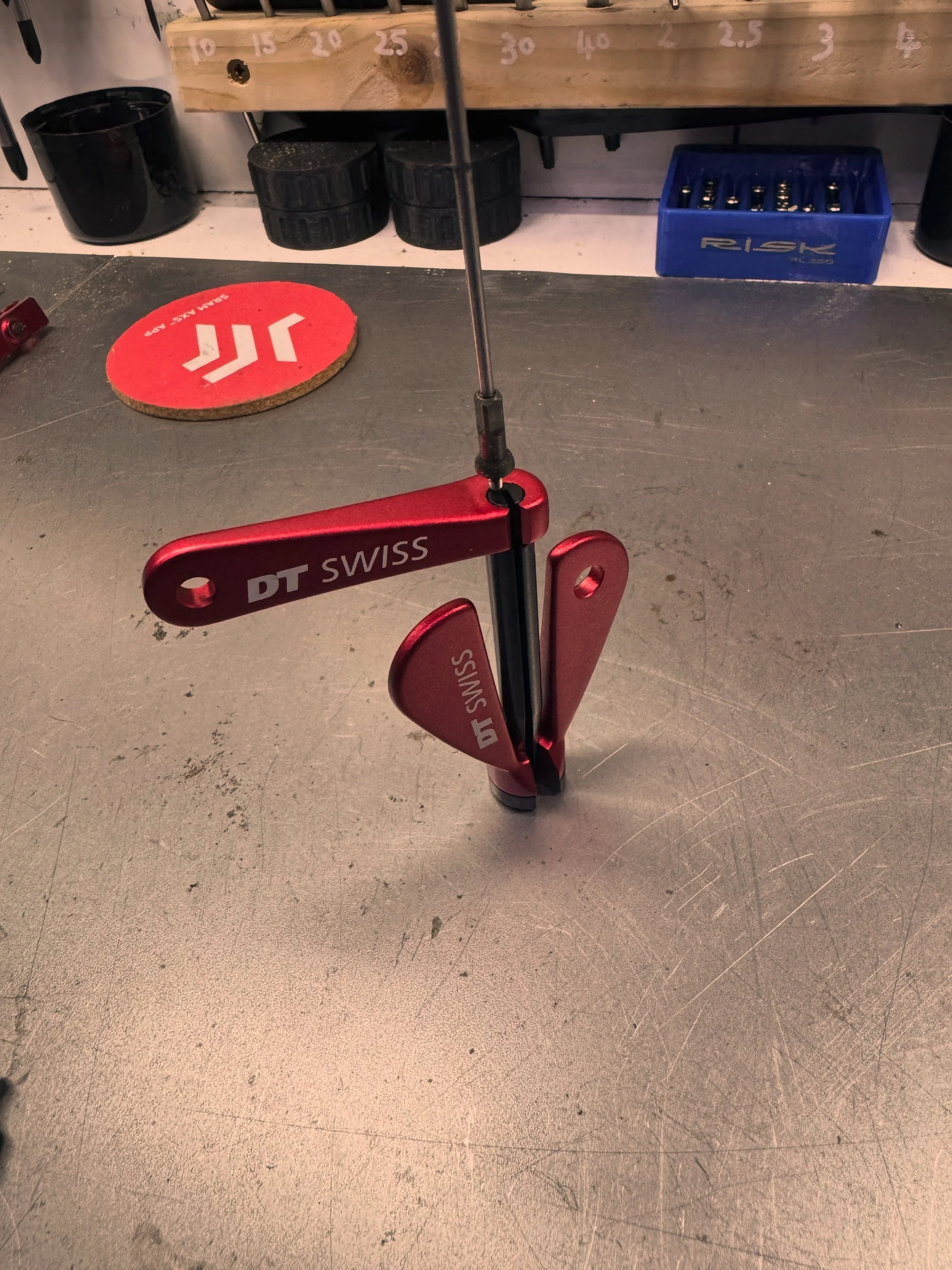 Two new additions to the workshop 

A couple of lovely tools from DT Swiss and Park Tool, supplied by Madison.

DT Swiss bladed spoke holder &mdash; keeps the spoke securely in place while tensioning, helping prevent the spoke from twisting.

Park To