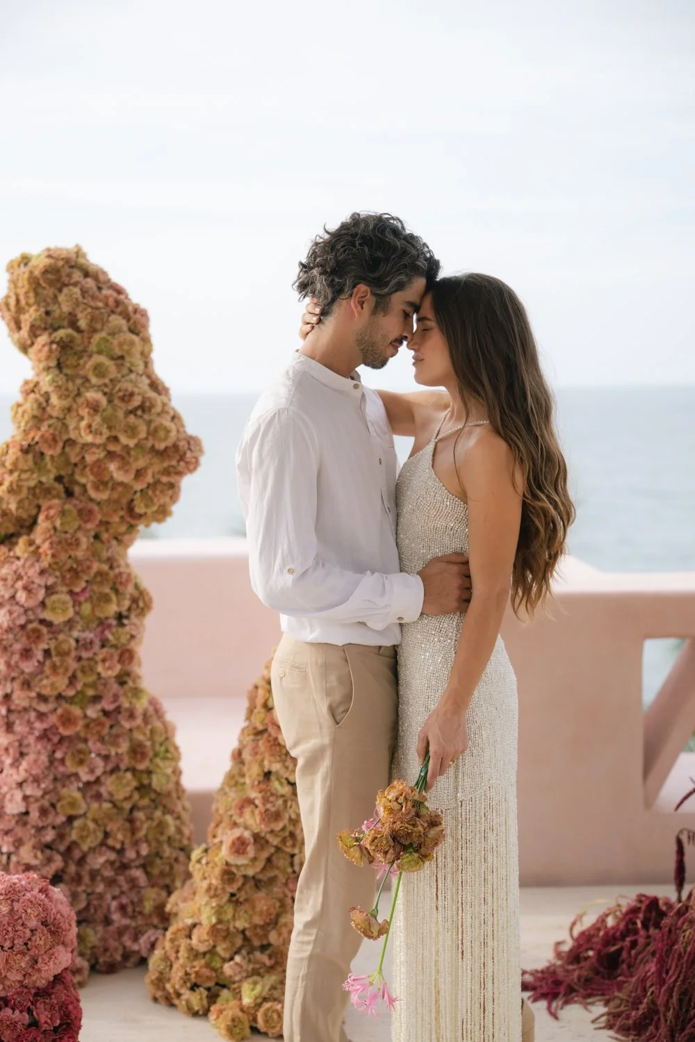 Editorial beach wedding inspiration in Mexico featuring modern ceremony design and soft coastal colors photographed by destination wedding photographer