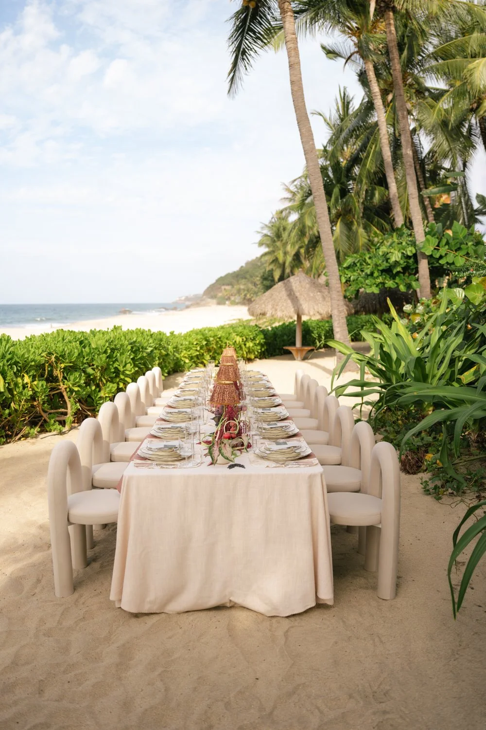 Aesthetic destination wedding in Mexico with sculptural florals and ocean views photographed by Mexico destination wedding photographer Victoria Kait