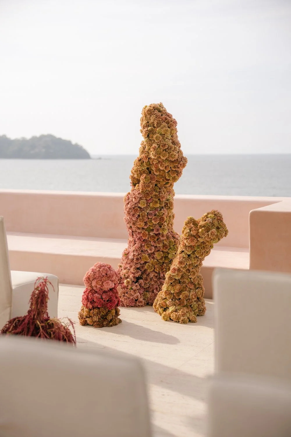 Aesthetic destination wedding in Mexico with sculptural florals and ocean views photographed by Mexico destination wedding photographer Victoria Kait