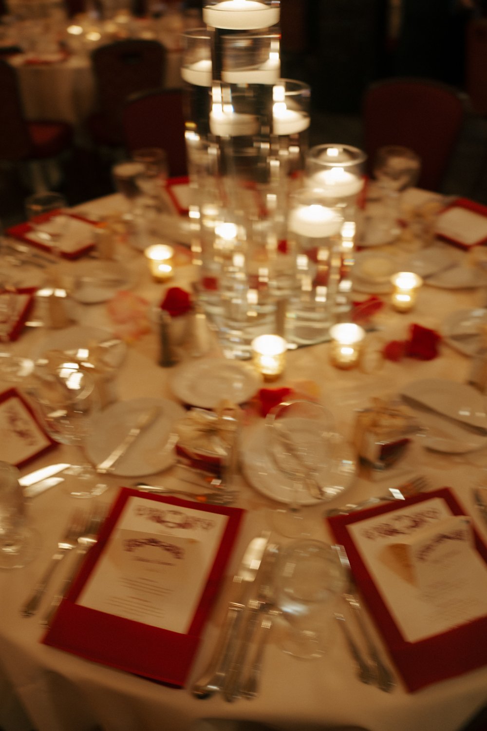 luxury reception detail with candles, roses and movement
